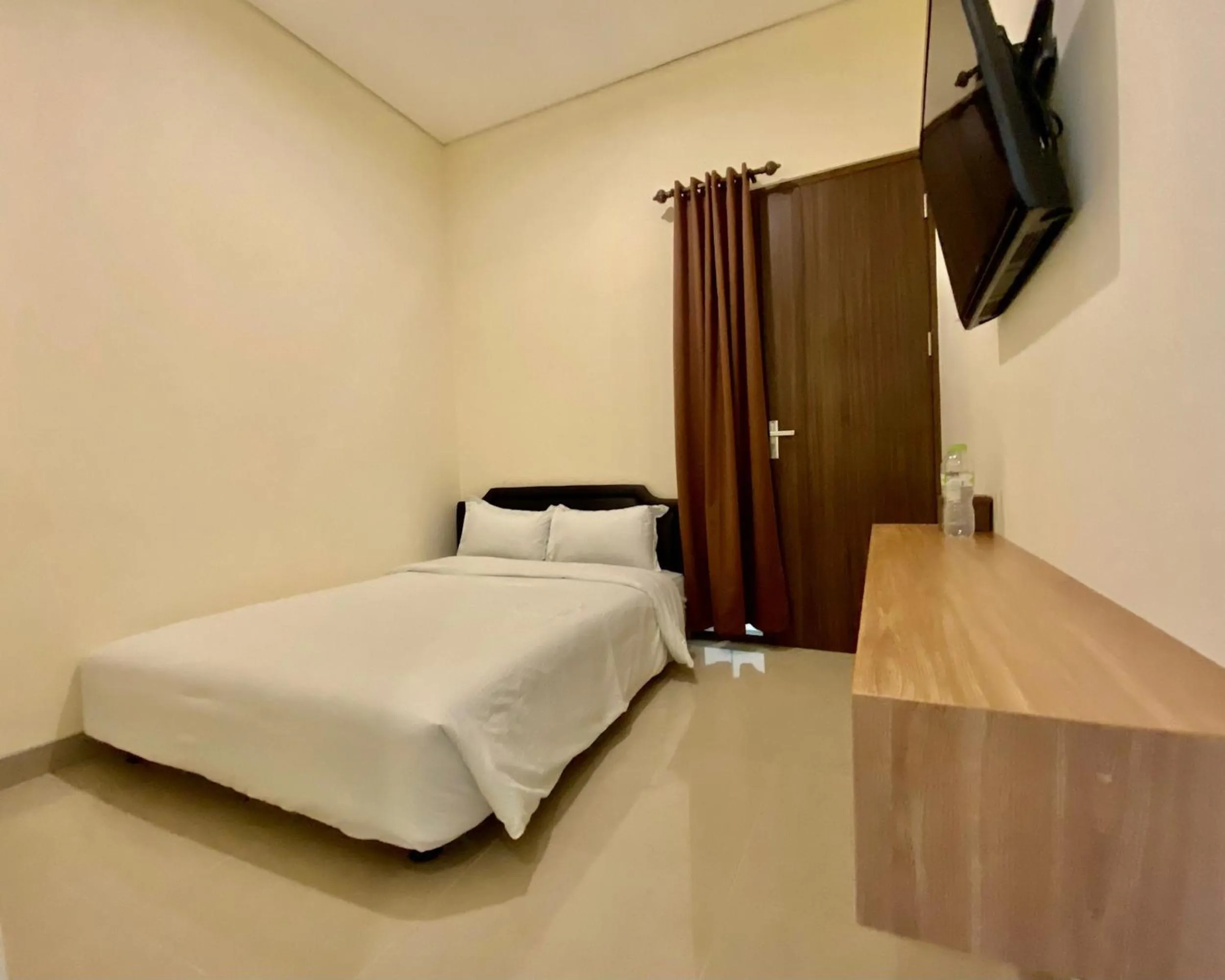 Bed in RedDoorz at Arkana Seturan Pakuwon Mall
