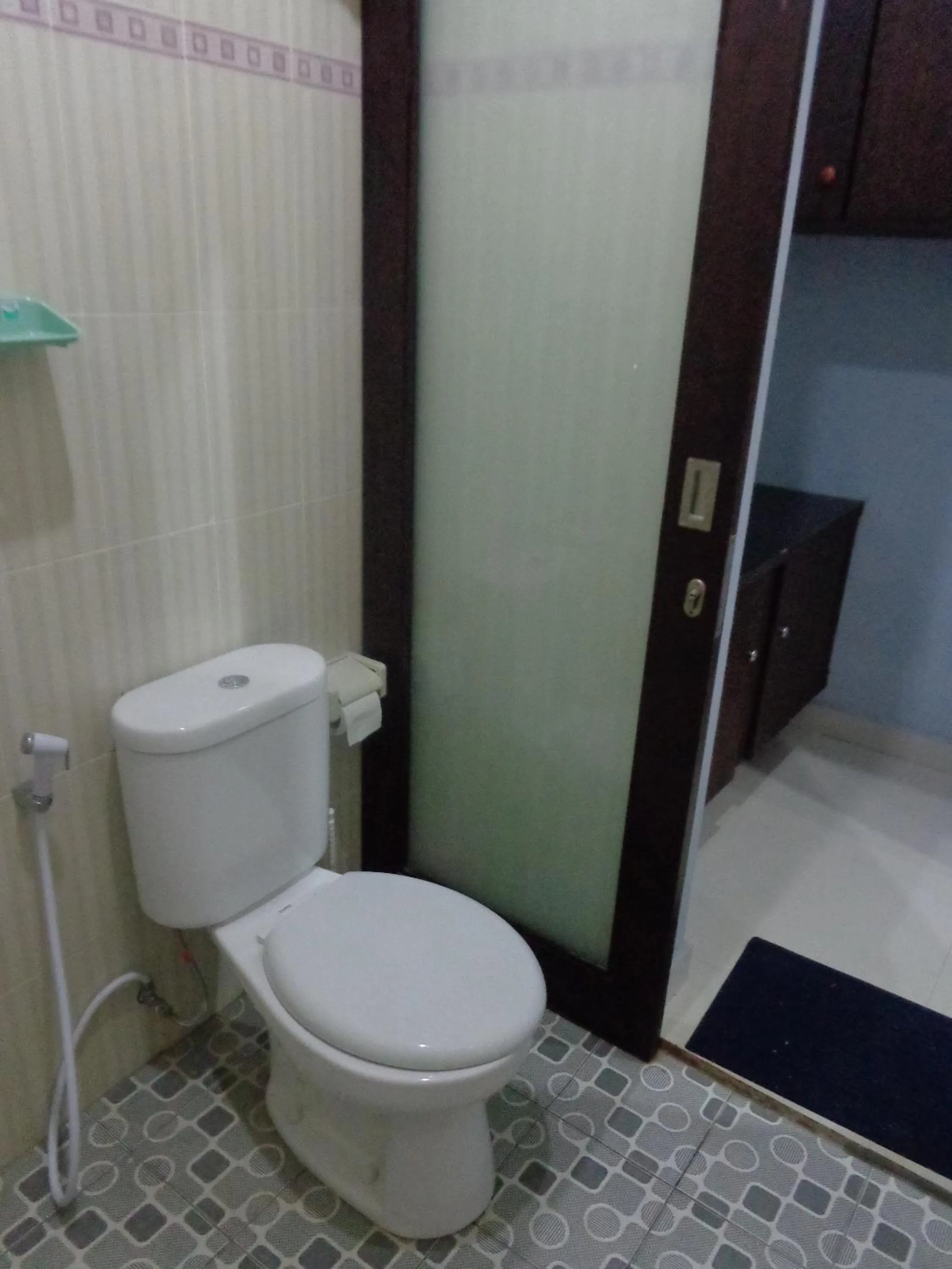 Toilet in Radha Homestay