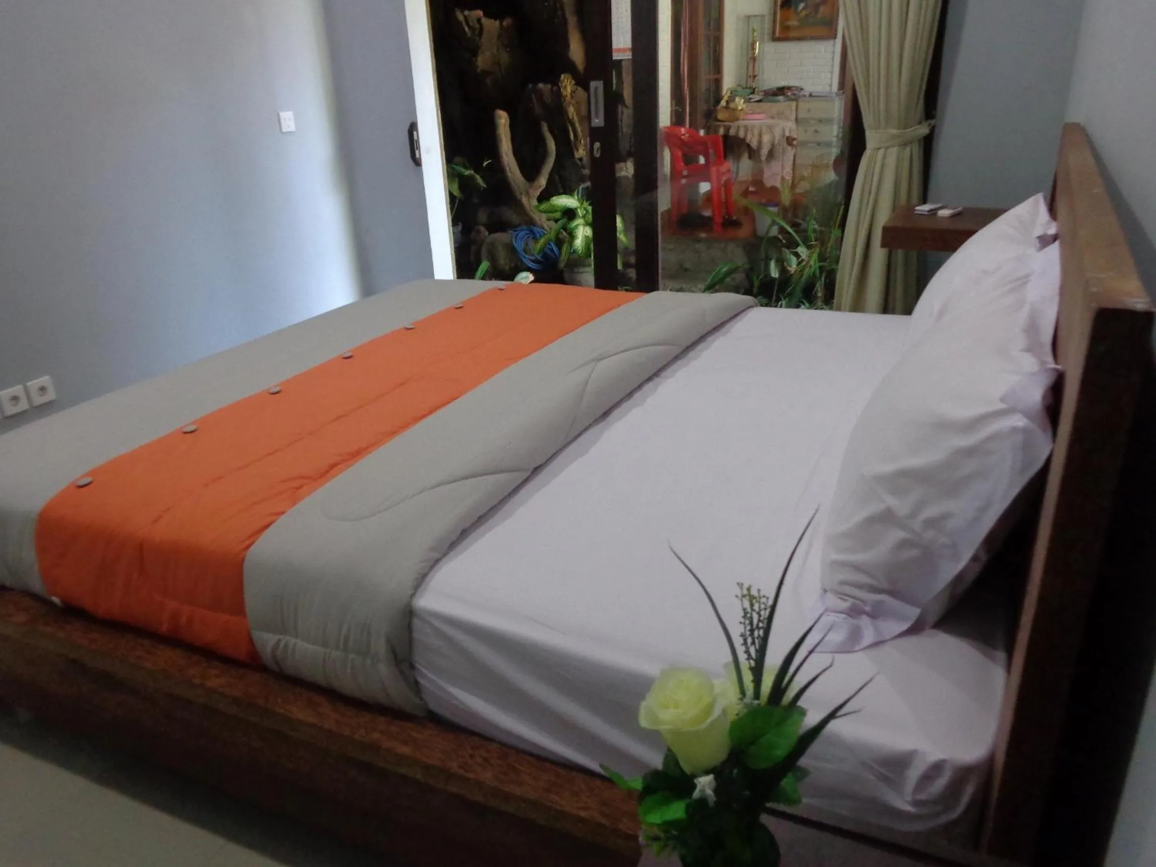 Bed in Radha Homestay