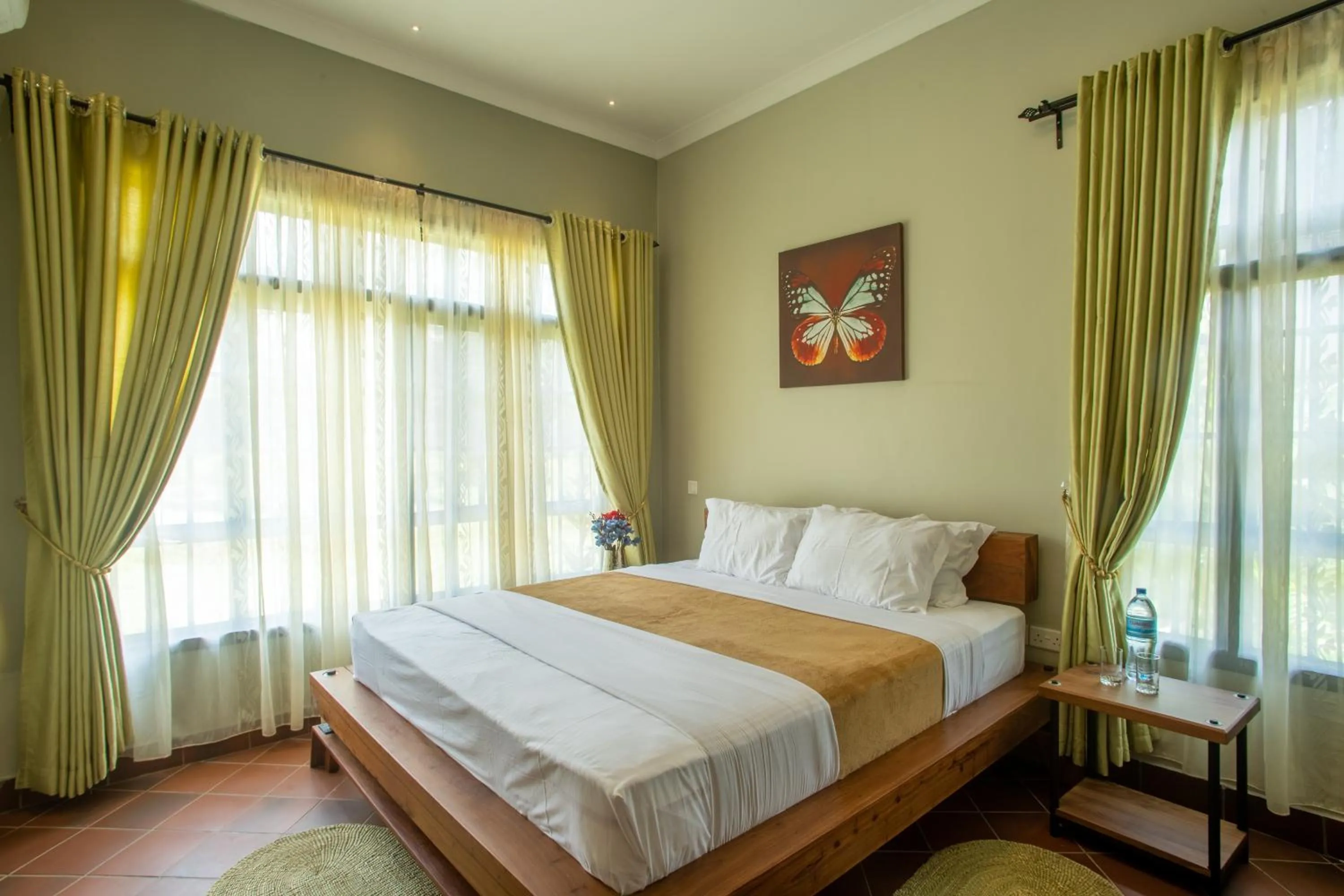 Bed in Kinga Homes Boutique Hotel