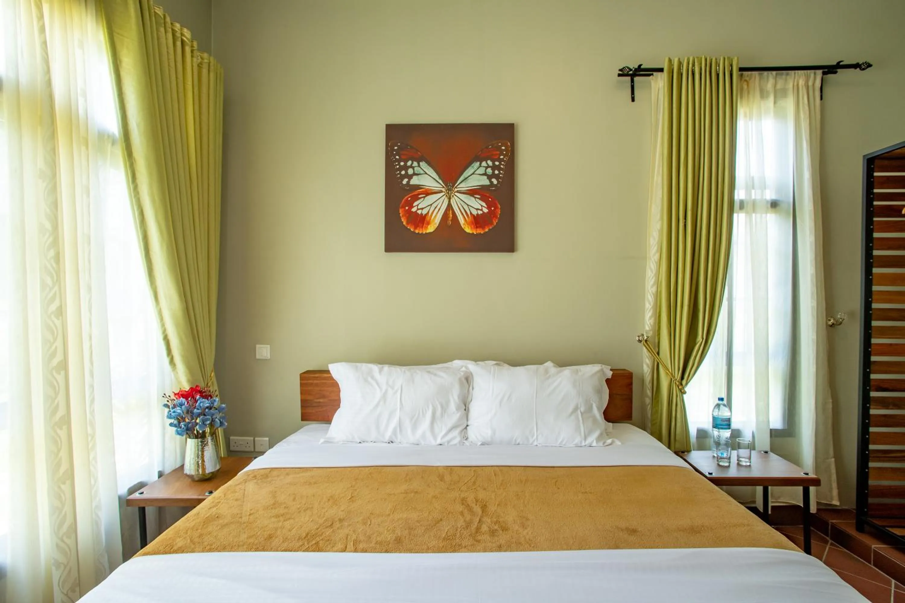 Bed in Kinga Homes Boutique Hotel