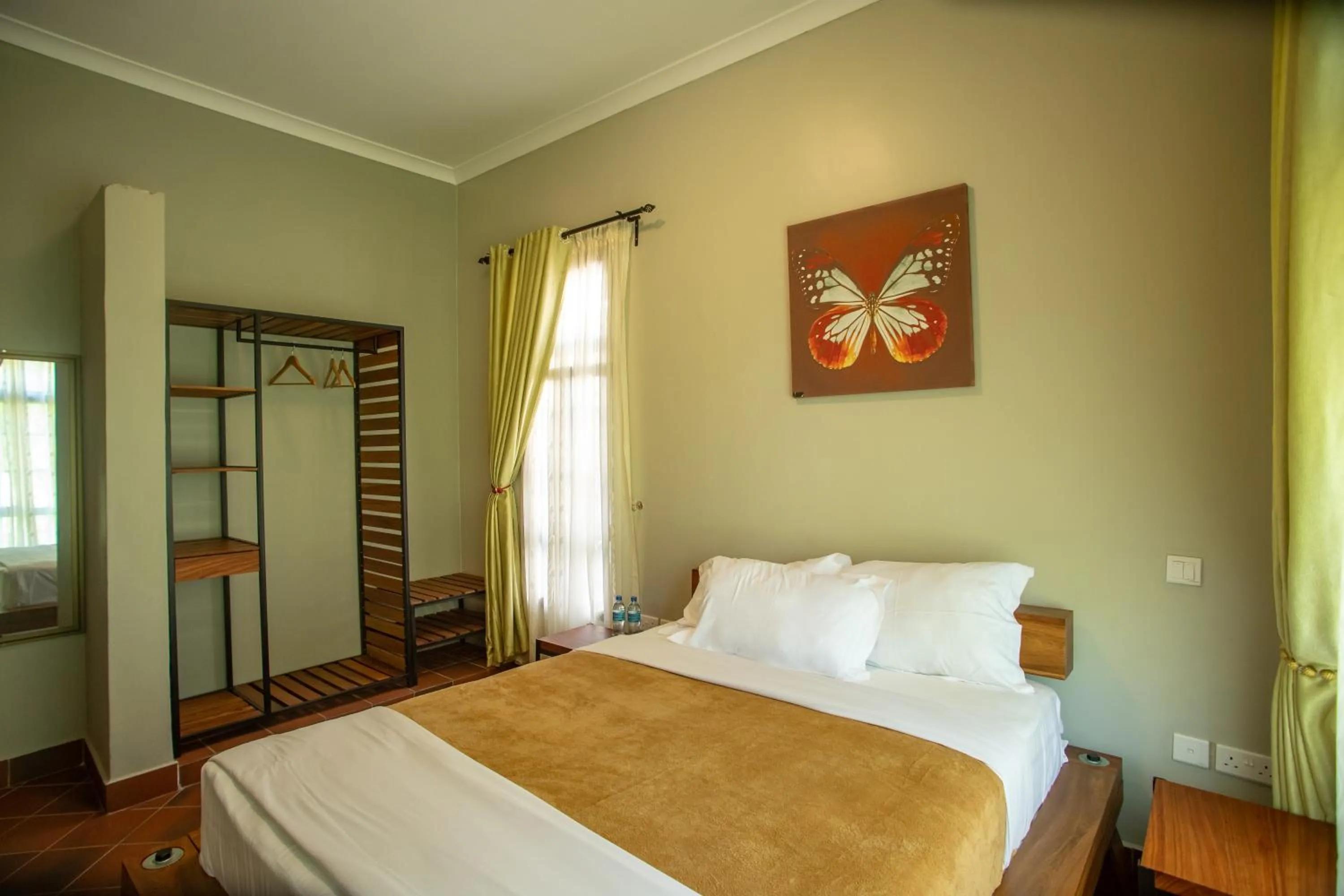 Bed in Kinga Homes Boutique Hotel