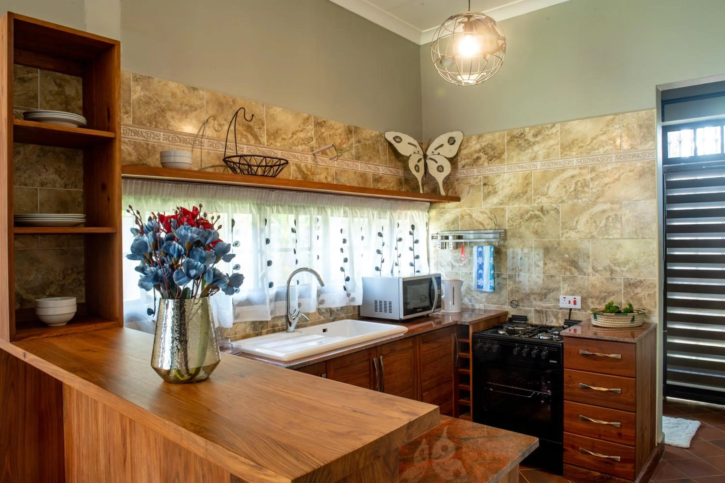 Kitchen or kitchenette in Kinga Homes Boutique Hotel