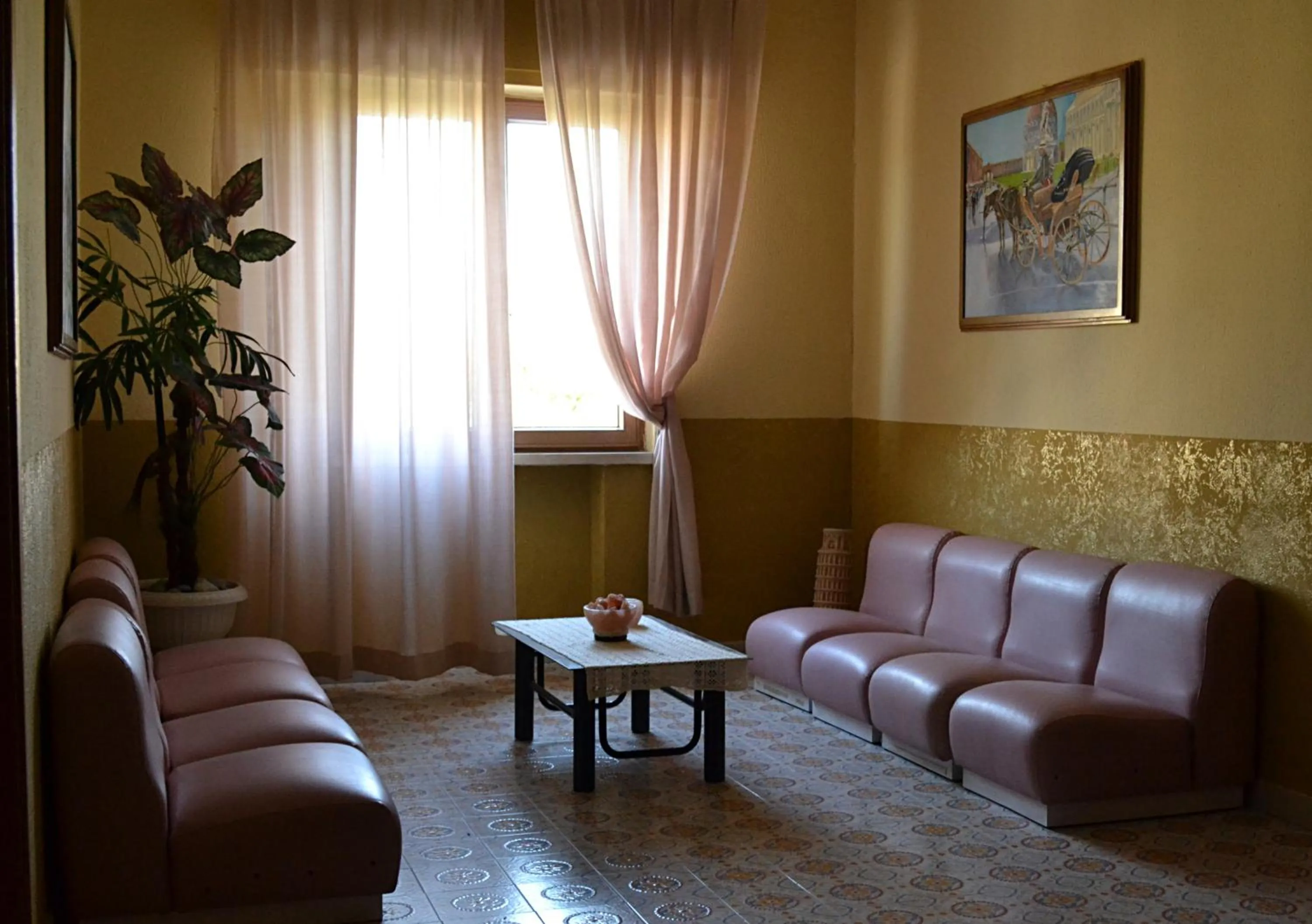 Communal lounge/ TV room in Hotel Costa Jonica