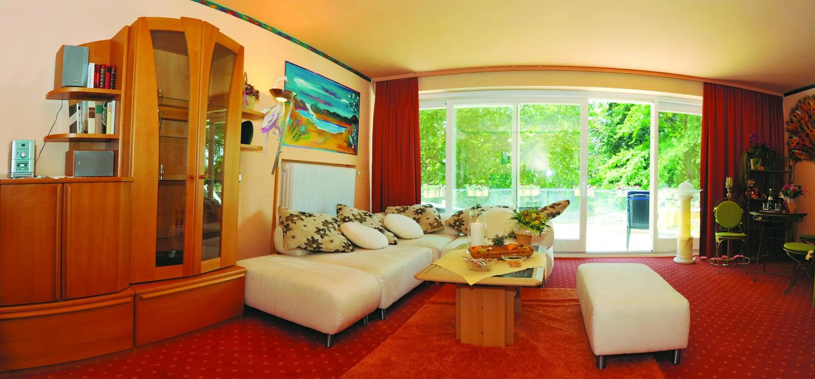 Living room, Bed in Eden Hotel