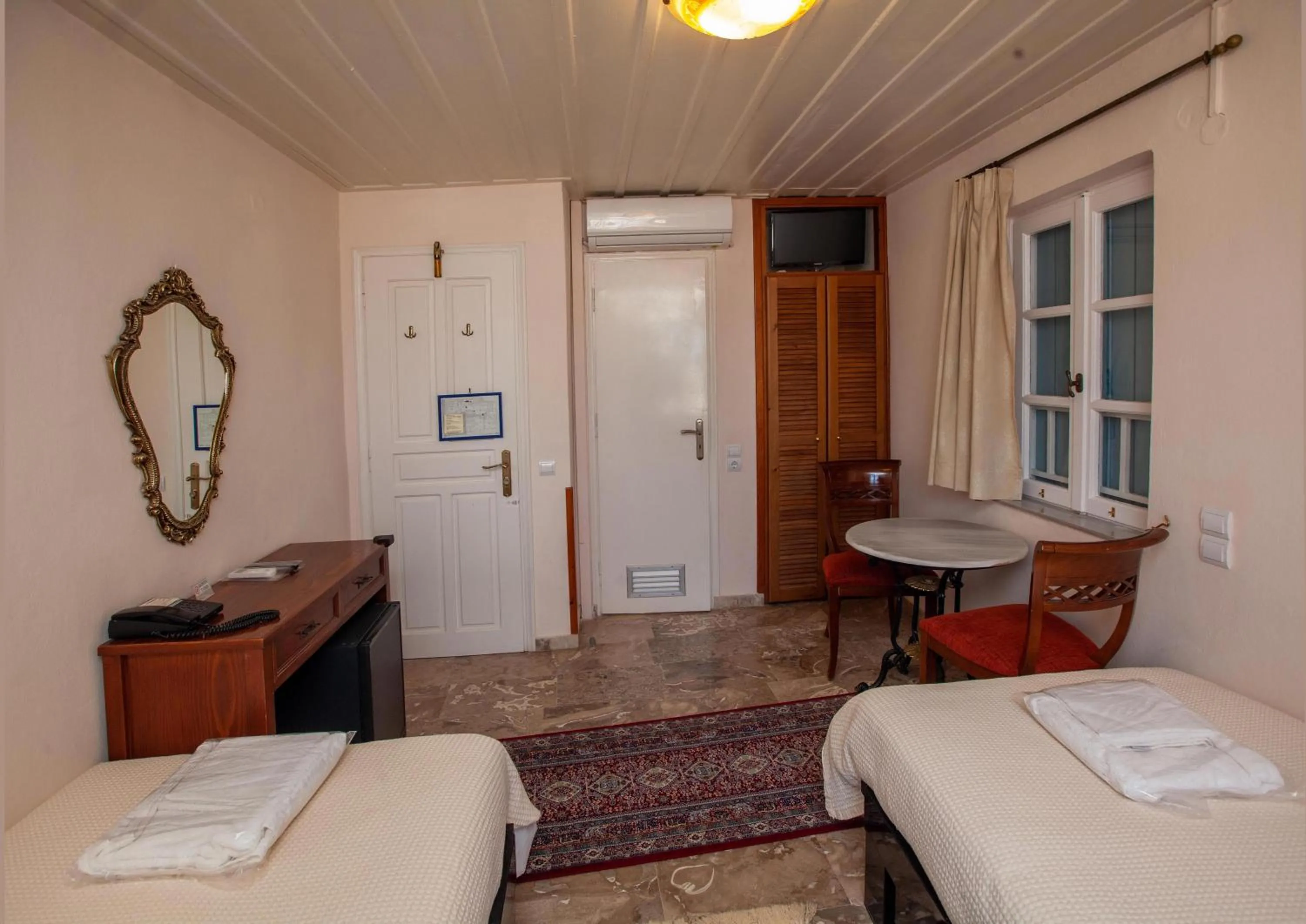 Bed in Byron Traditional Hotel