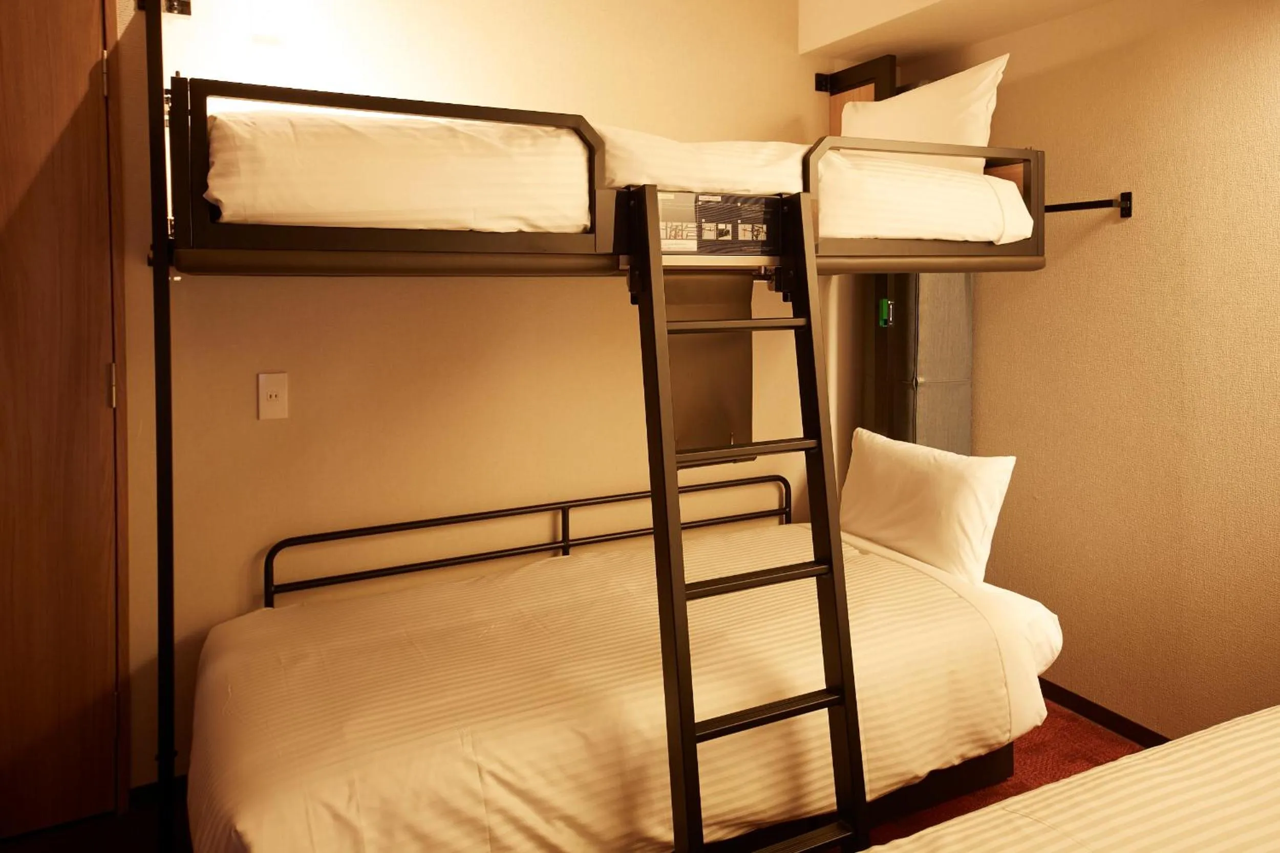 Bed in MONday Apart Premium KYOTO Station