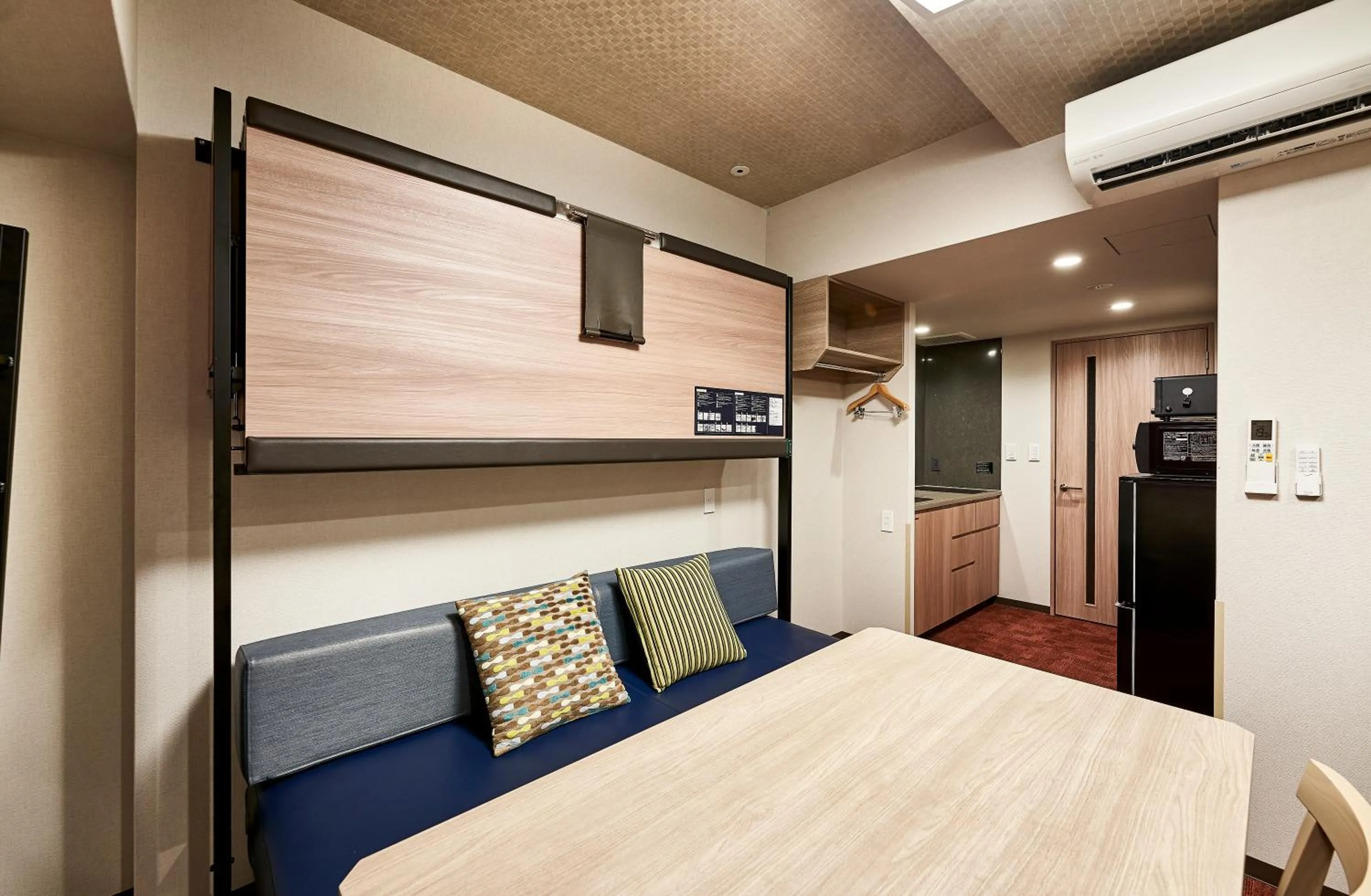 Bed in MONday Apart Premium KYOTO Station