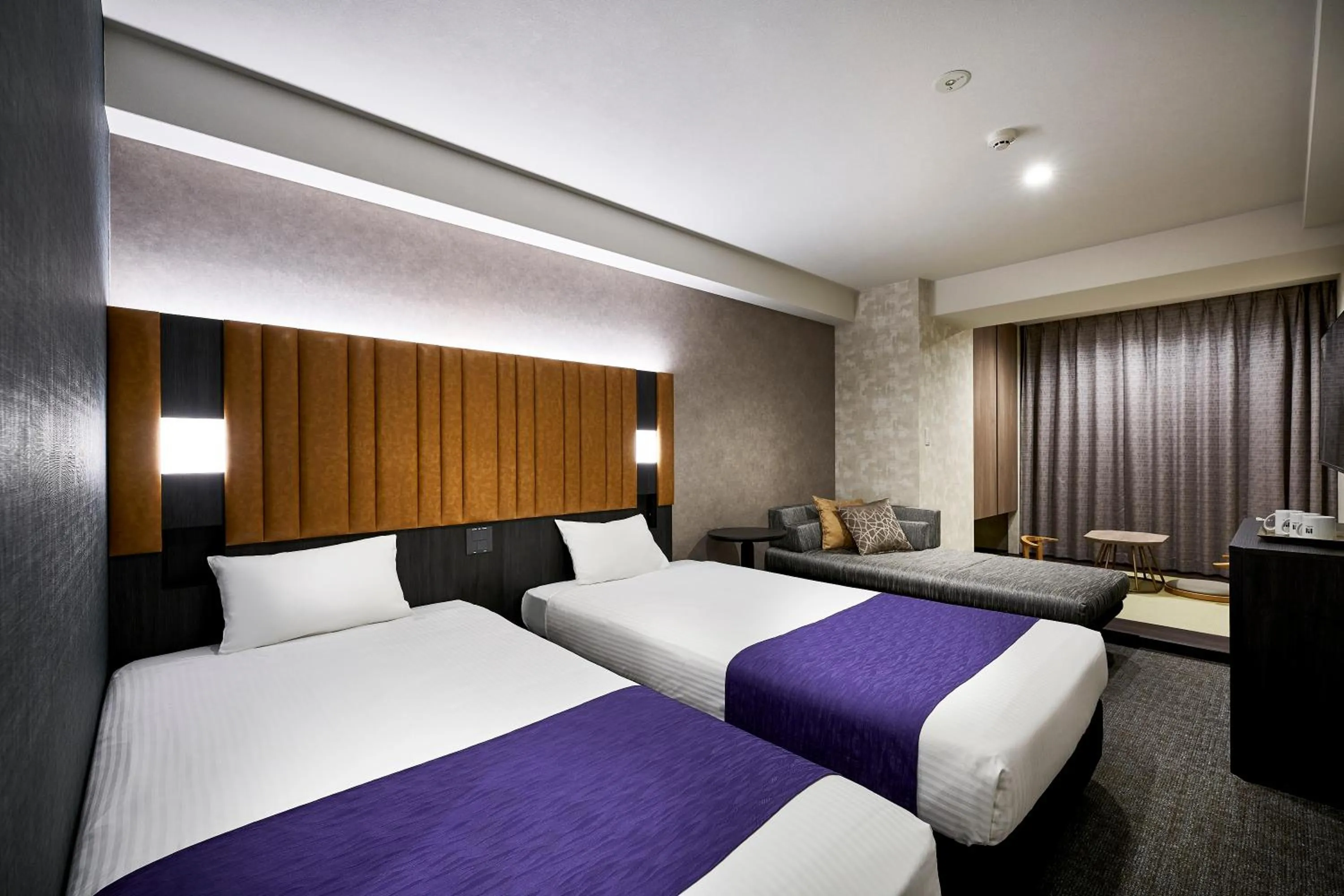 Bed in hotel MONday KYOTO MARUTAMACHI