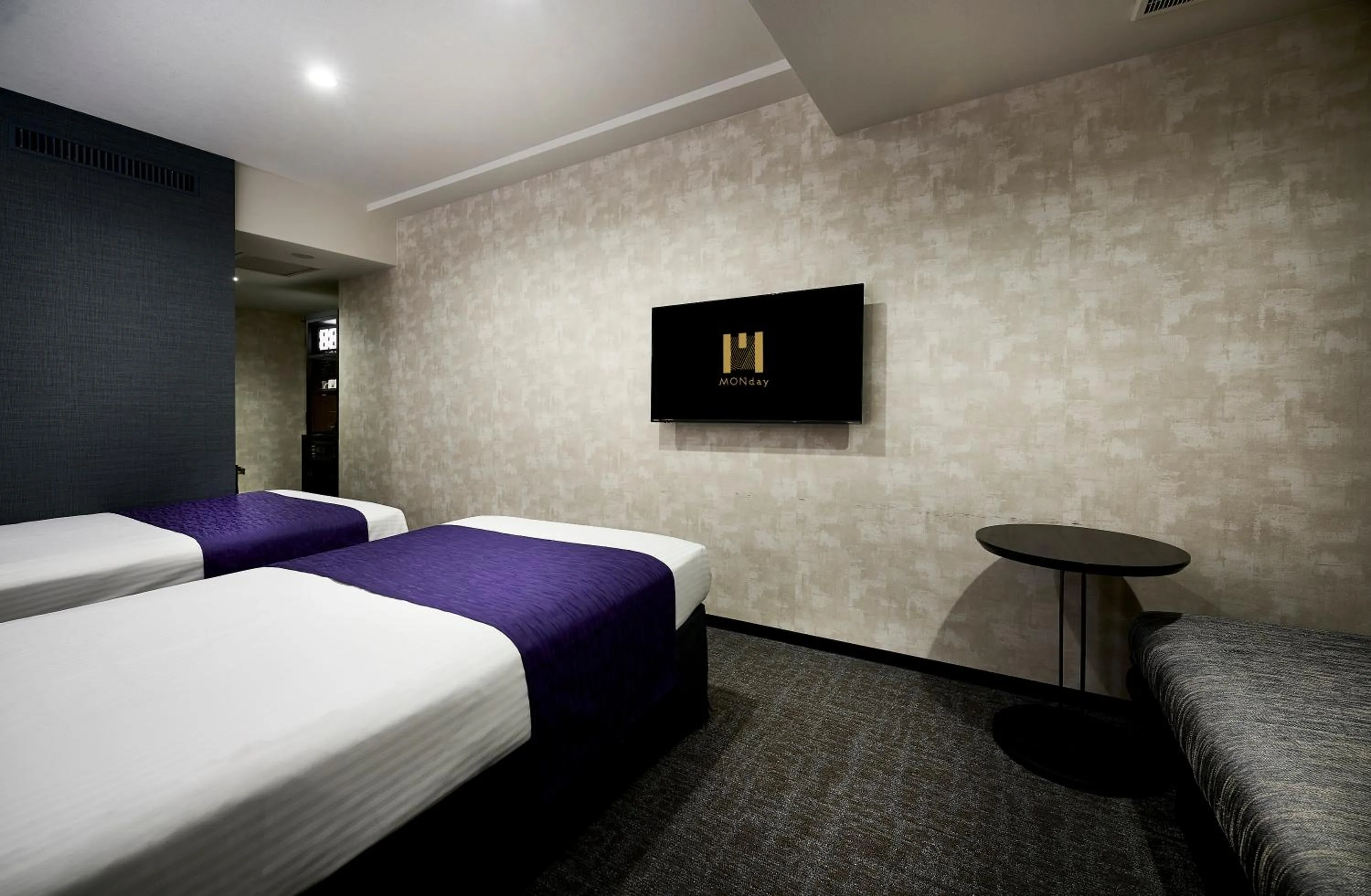 Bed in hotel MONday KYOTO MARUTAMACHI