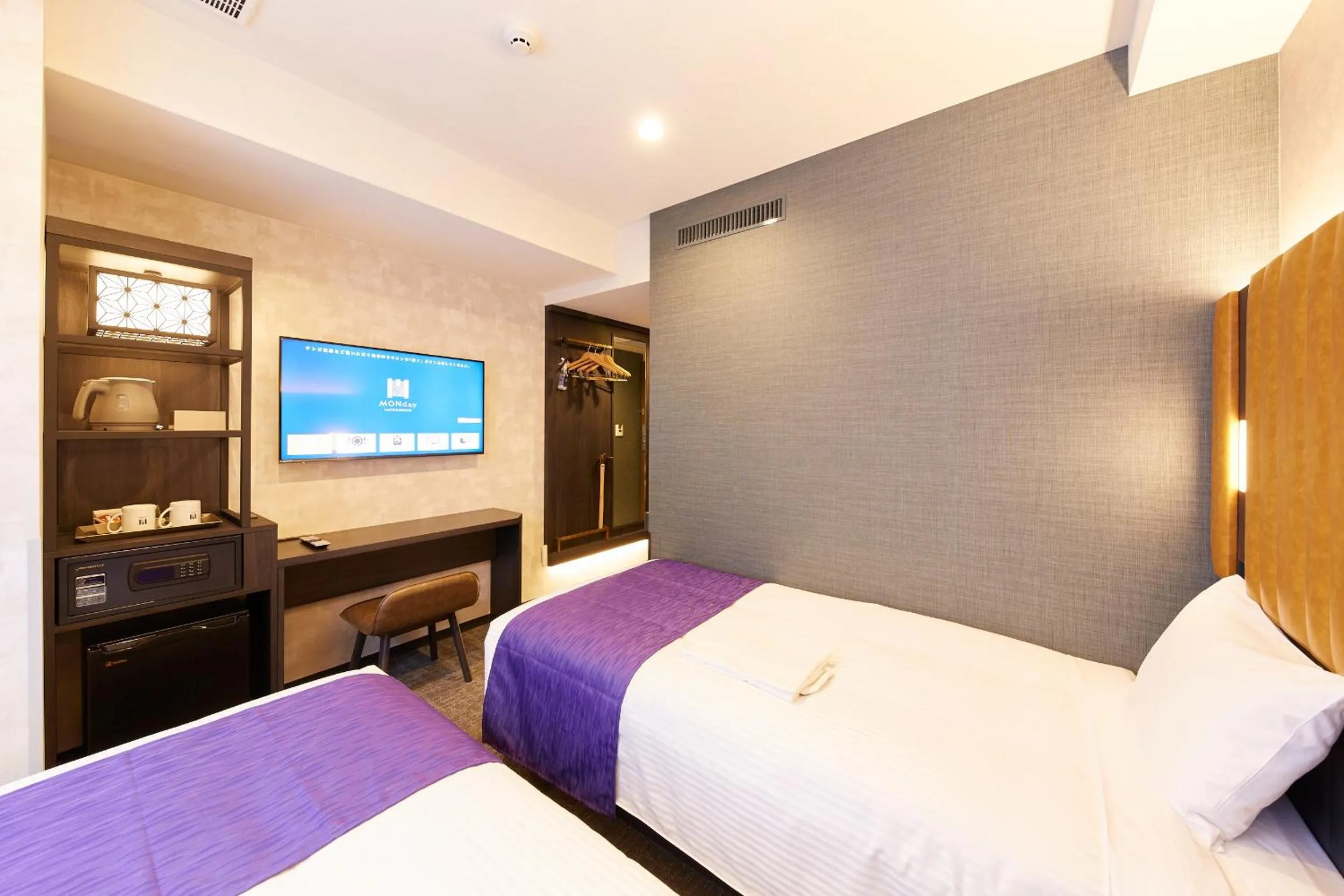 Bed in hotel MONday KYOTO MARUTAMACHI