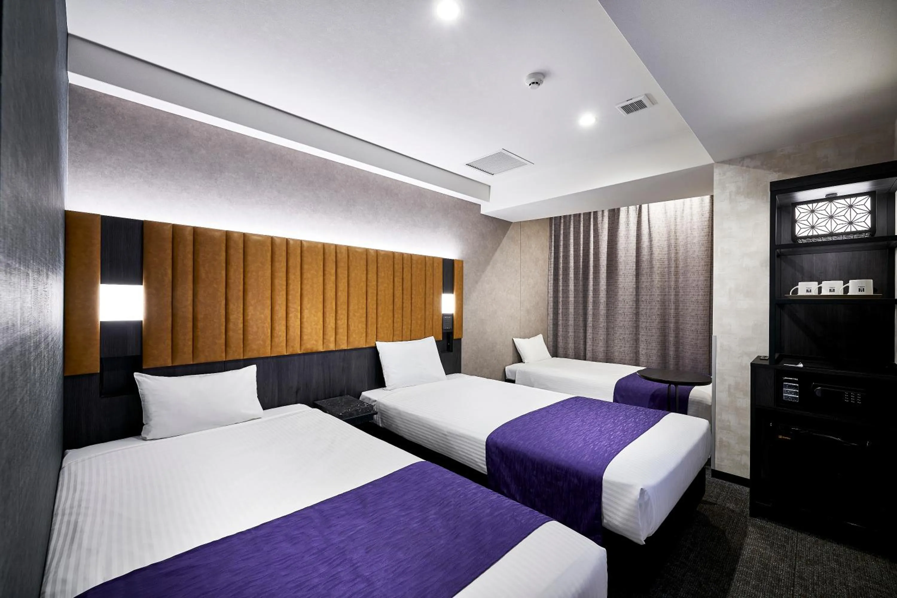 Bed in hotel MONday KYOTO MARUTAMACHI