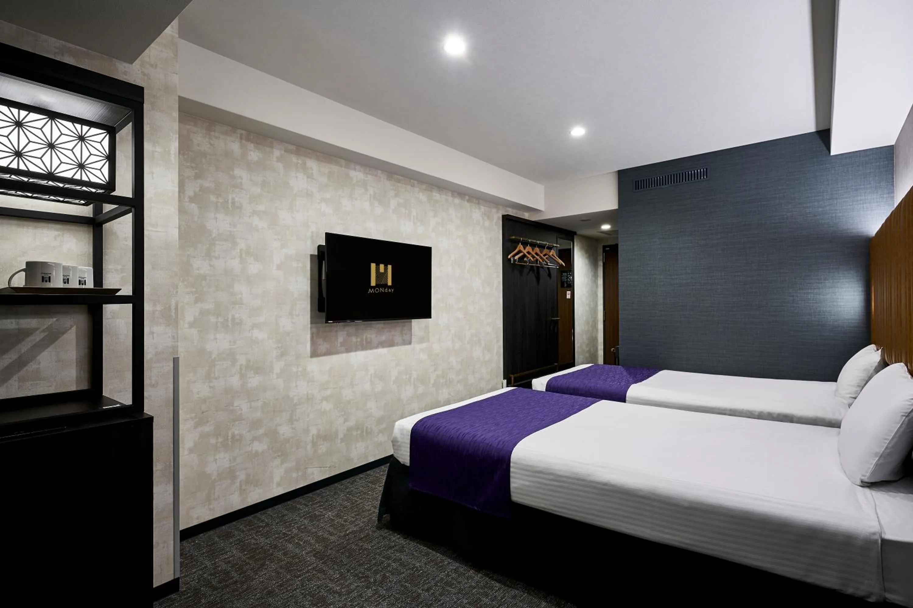 Bed in hotel MONday KYOTO MARUTAMACHI