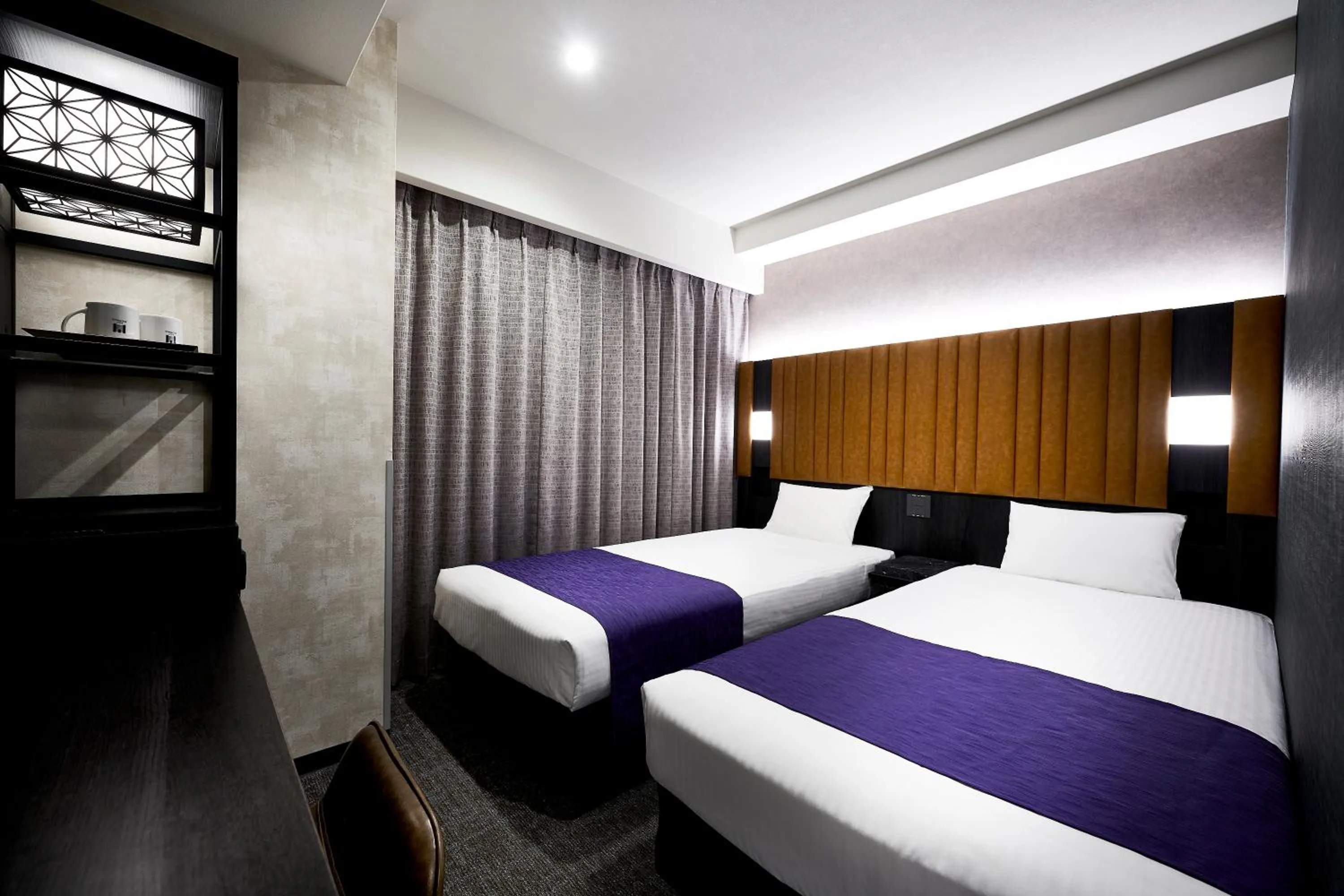 Bed in hotel MONday KYOTO MARUTAMACHI