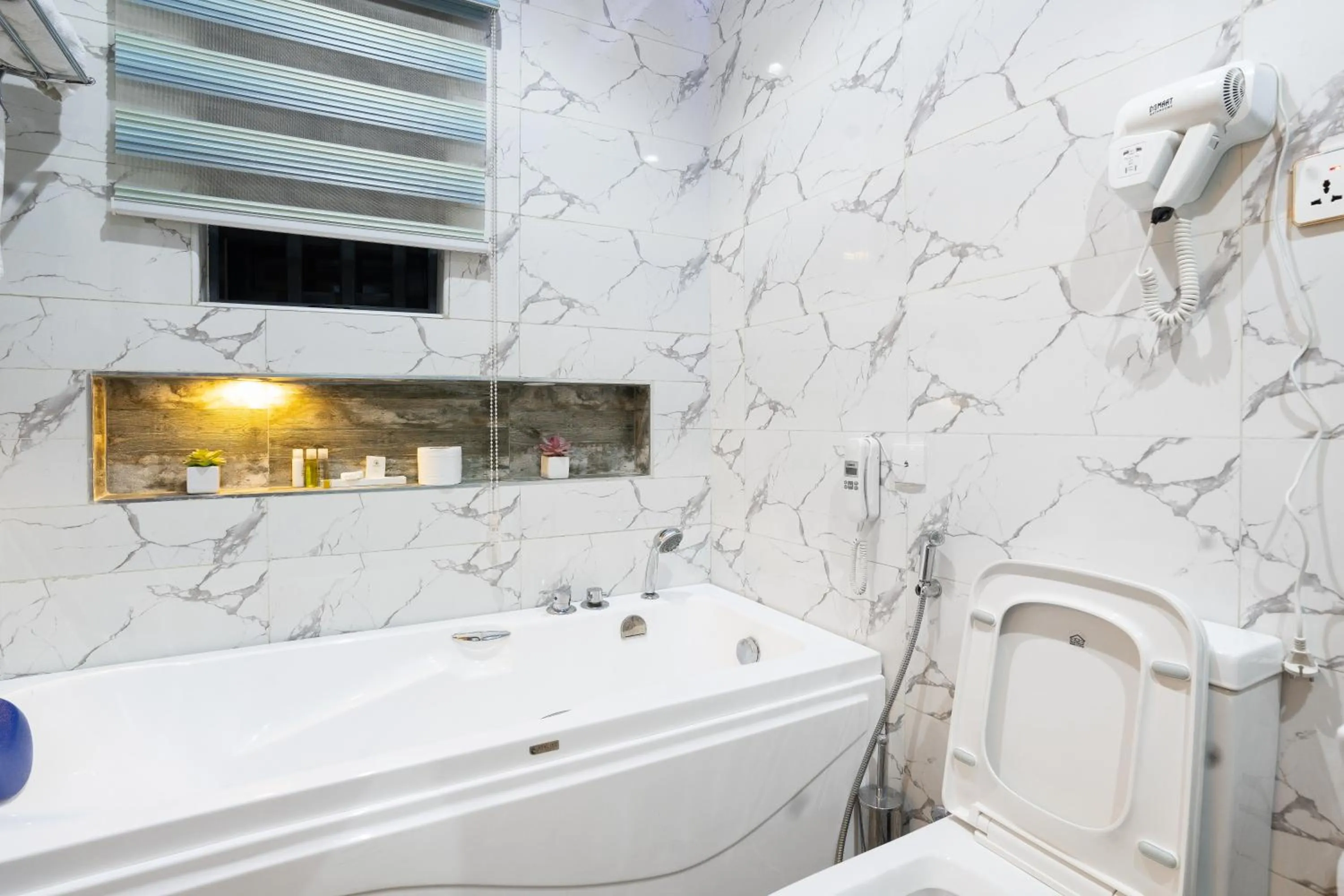 Toilet in God's Touch Apartments Signature