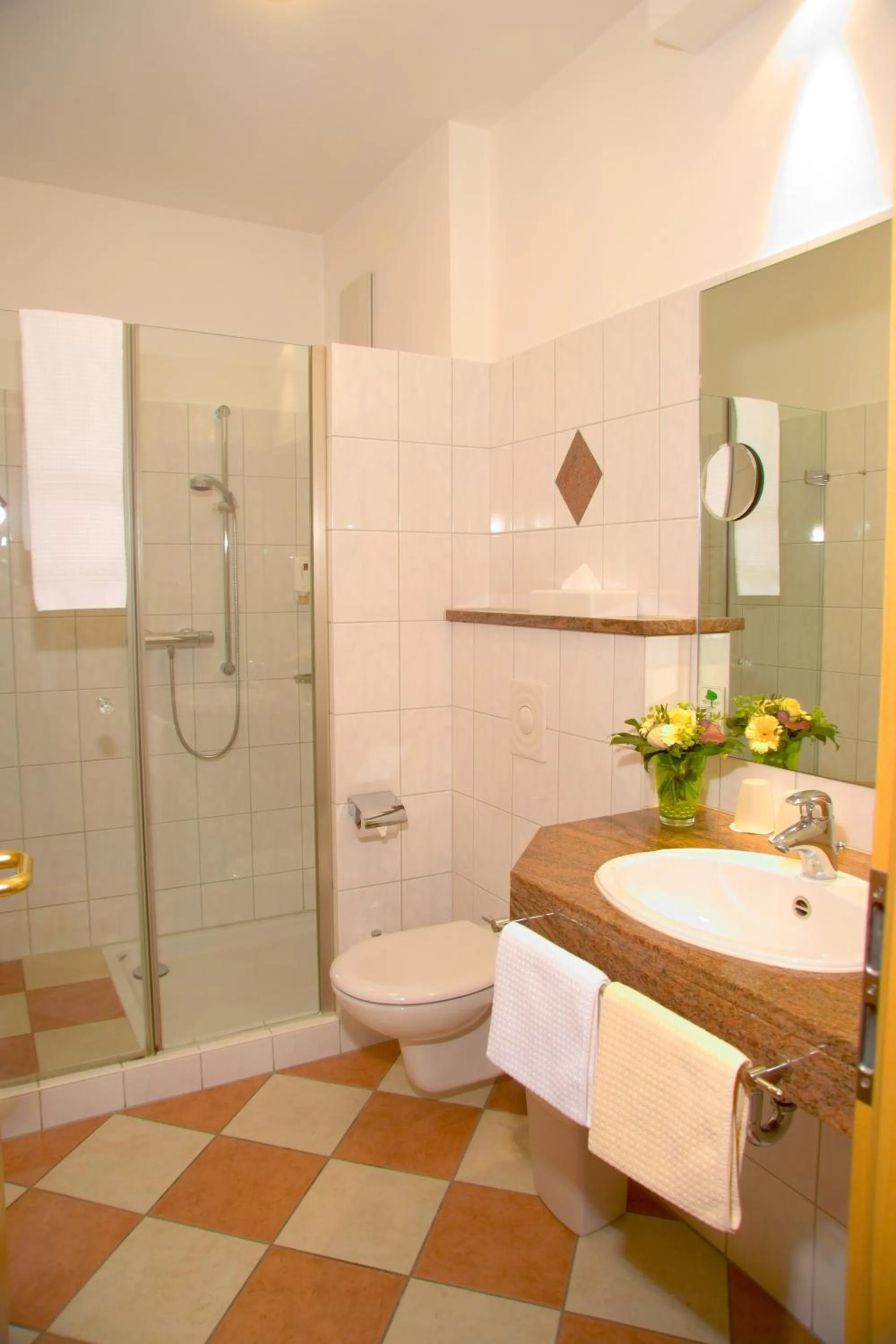 Bathroom in Hotel & Apartments Leugermann