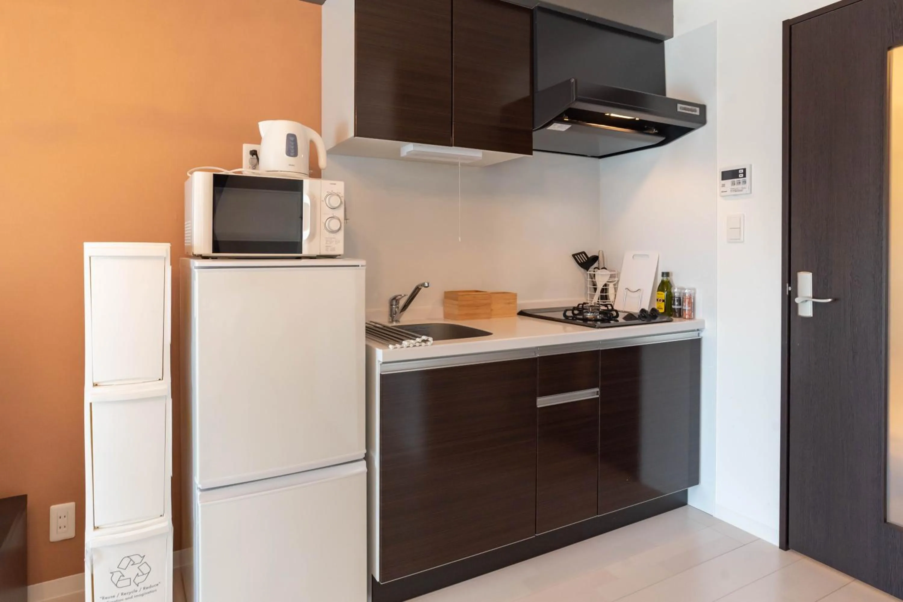 Kitchen or kitchenette in Bijou Suites Bloom