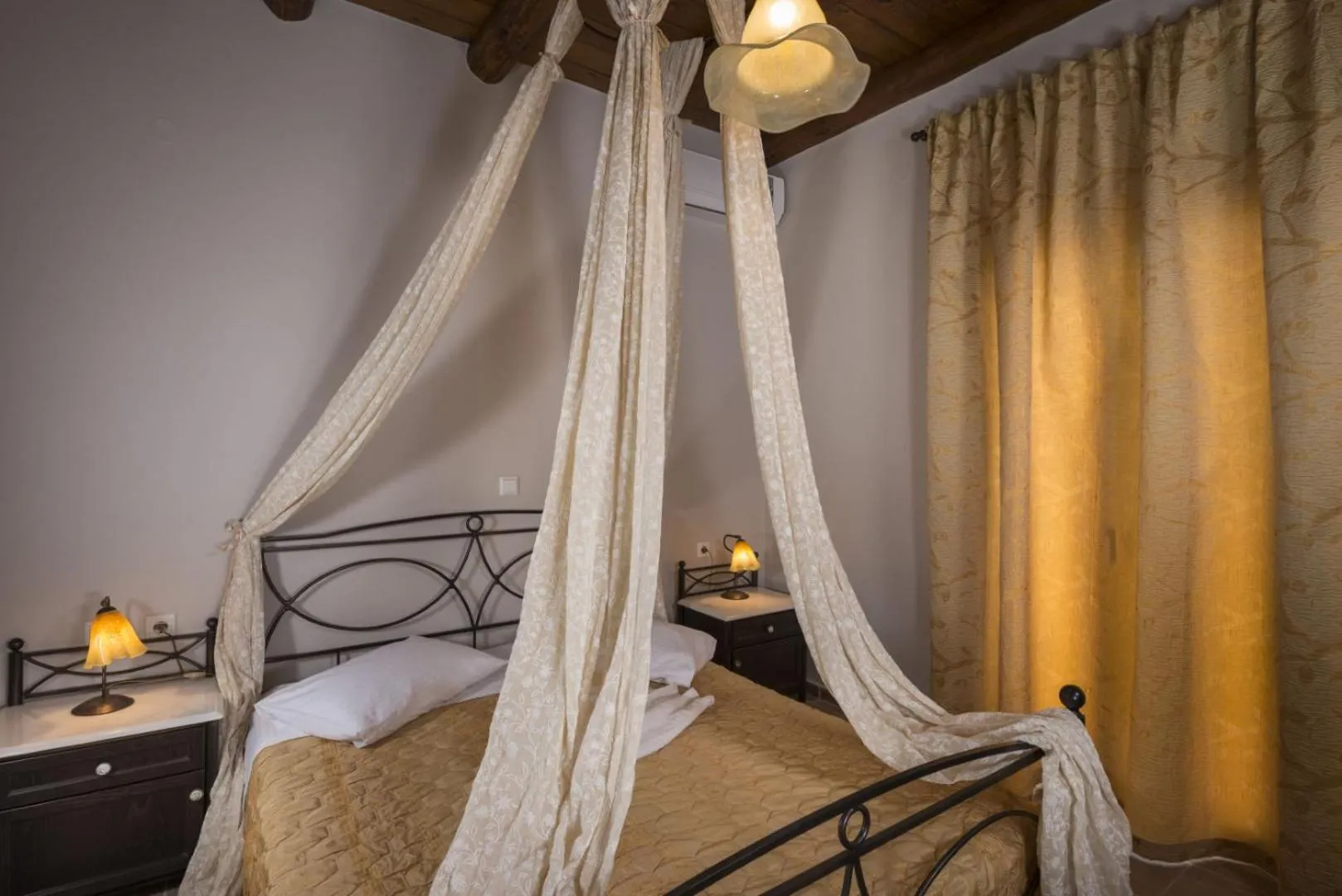 Bed in Athina Luxury Villas