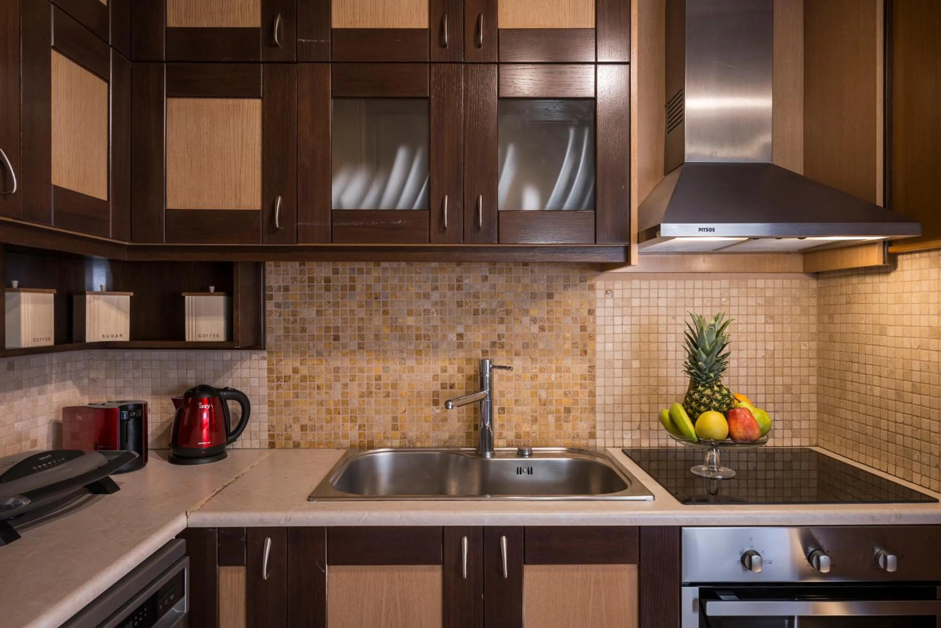 Kitchen or kitchenette in Athina Luxury Villas