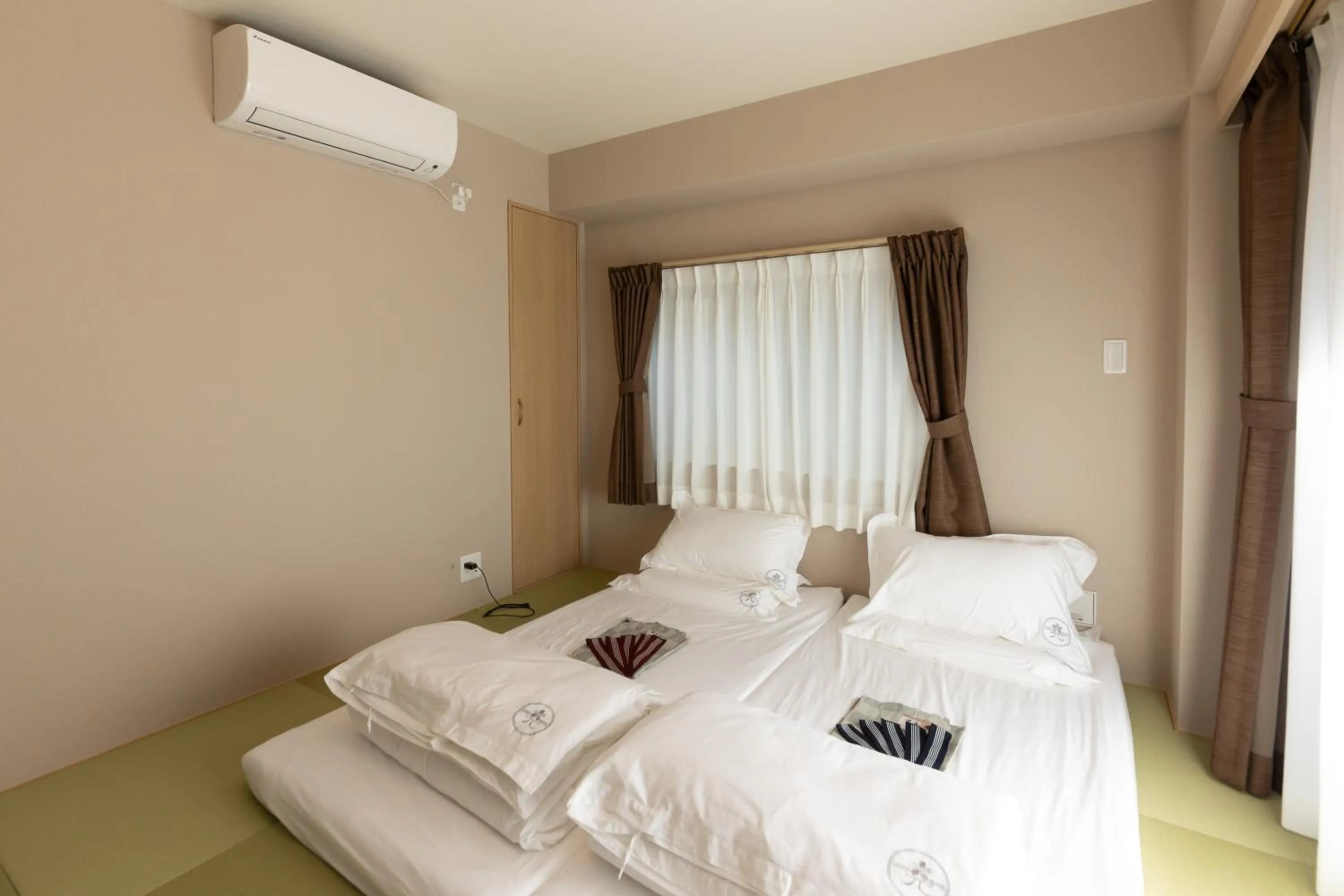 Bed in 灯光旅館 Light hotel