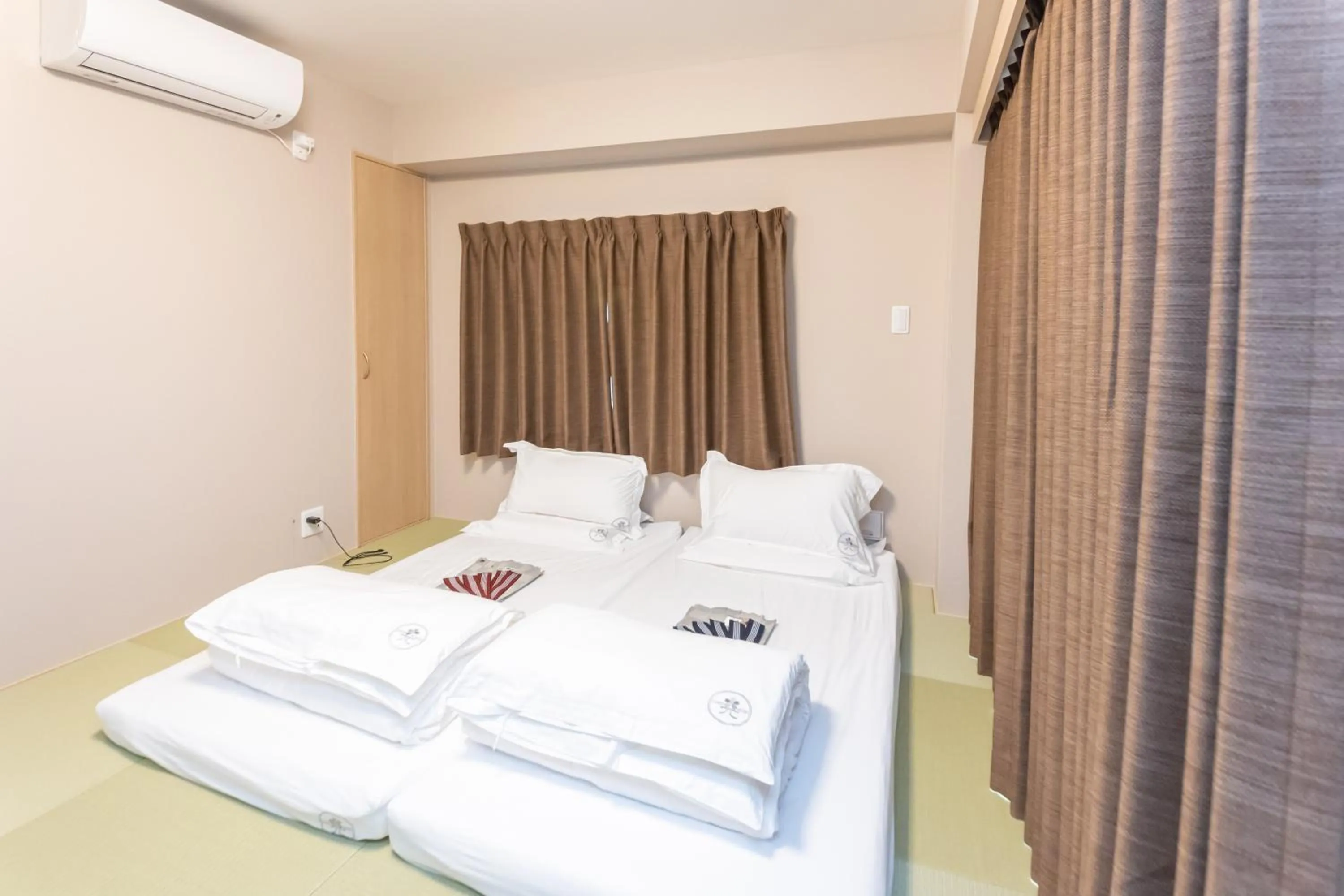 Bed in 灯光旅館 Light hotel