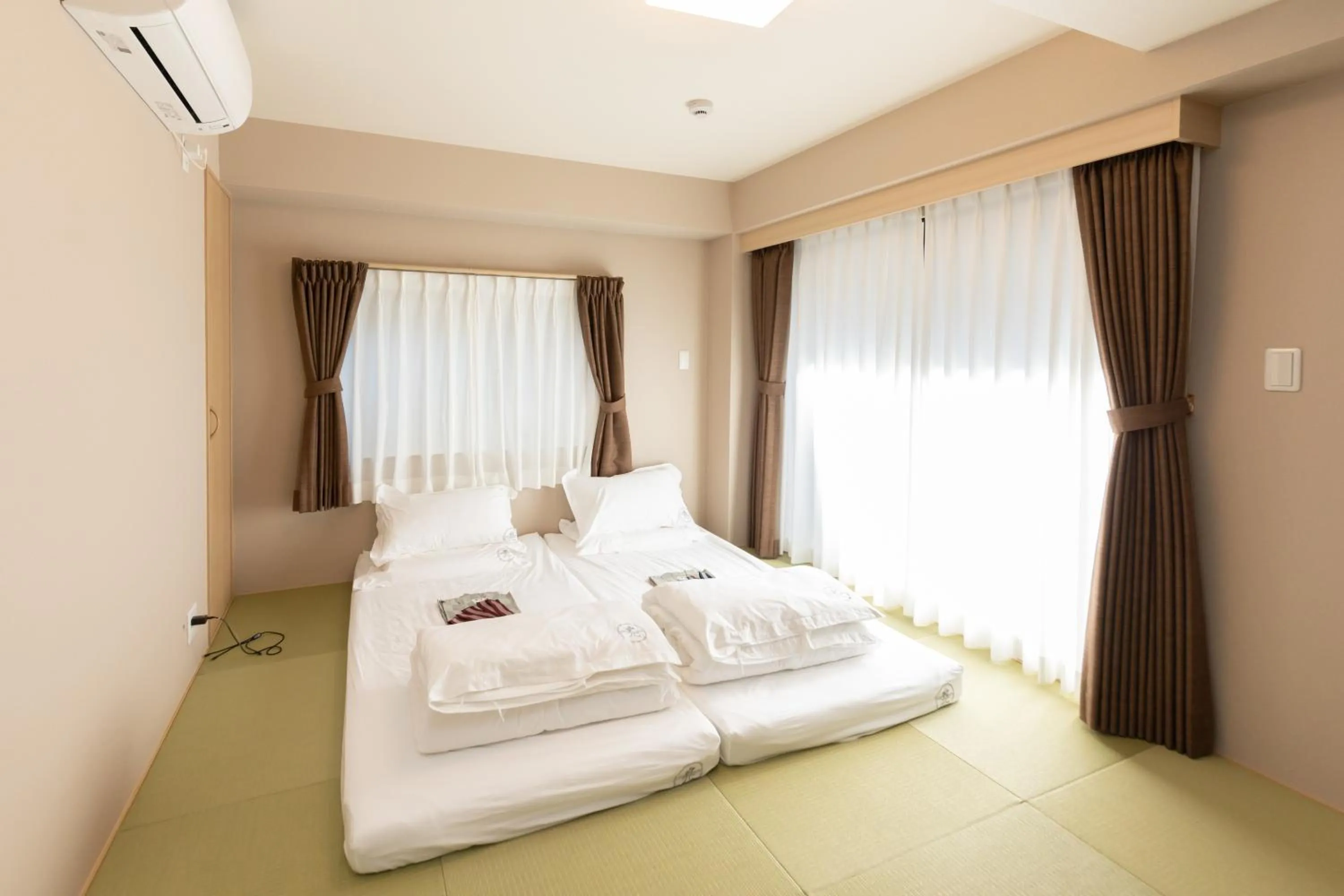 Bed in 灯光旅館 Light hotel