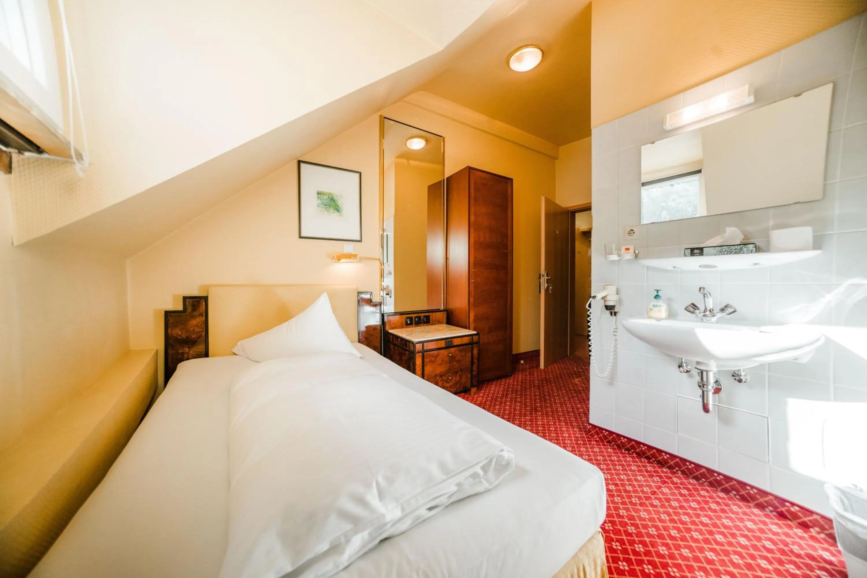 Photo of the whole room, Bed in Hotel Rheinfels