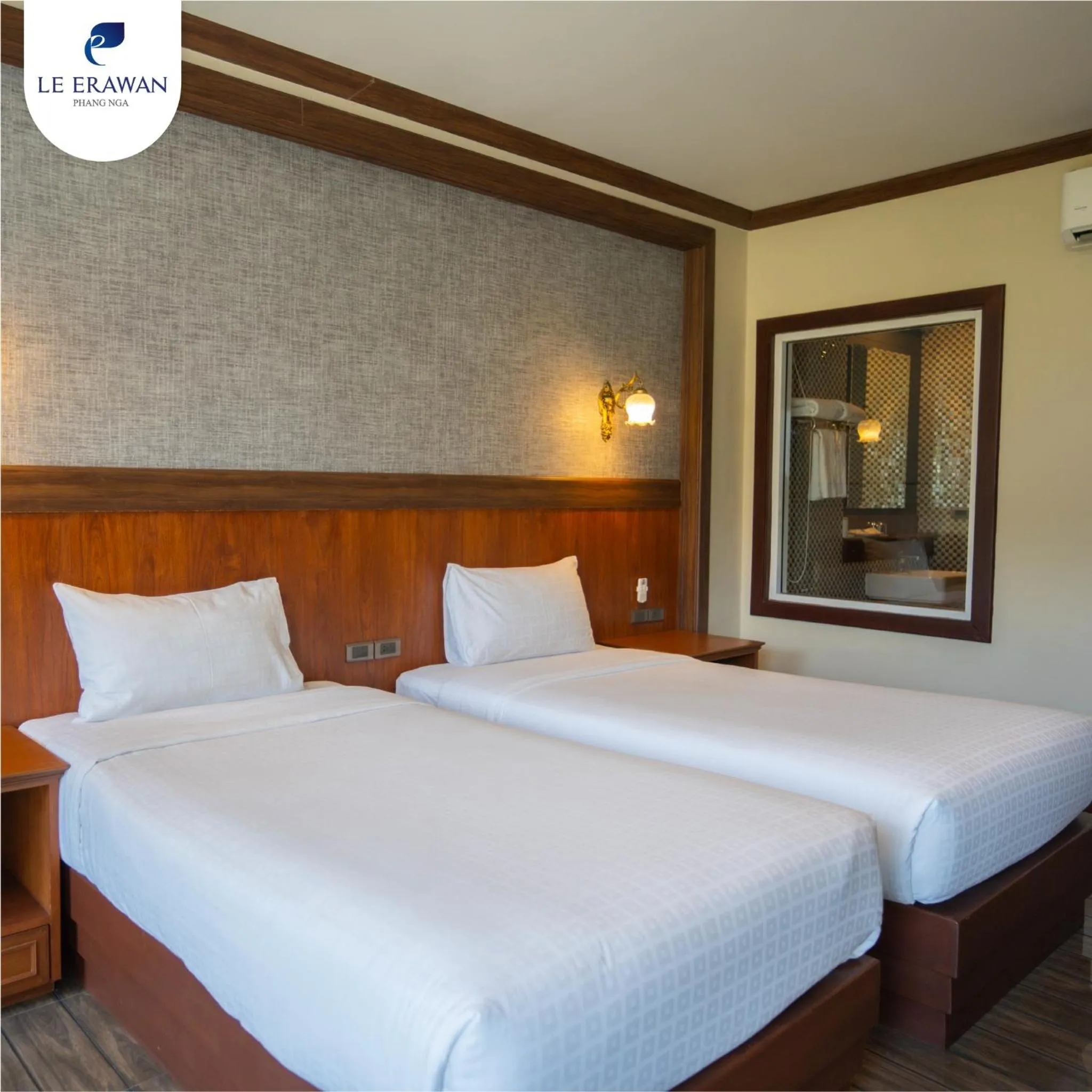 Bed in Le Erawan Phang Nga Hotel