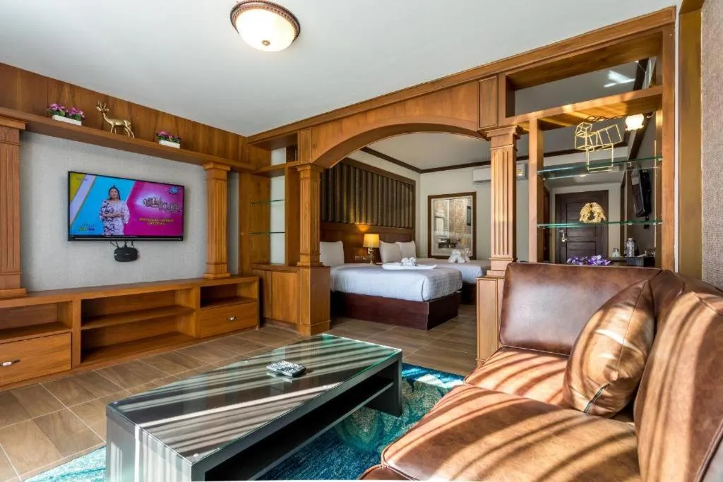 Bed in Le Erawan Phang Nga Hotel