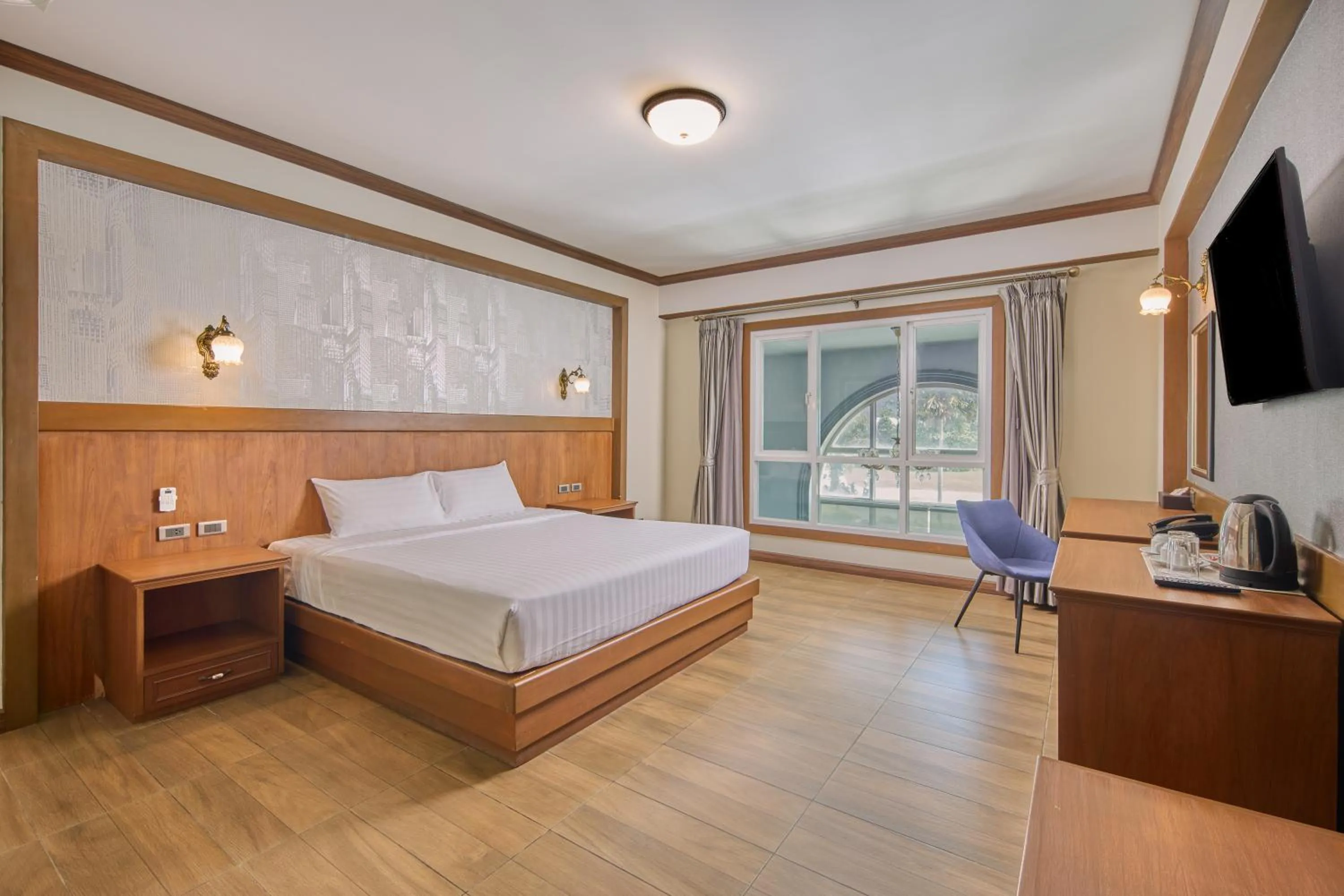 Bed in Le Erawan Phang Nga Hotel