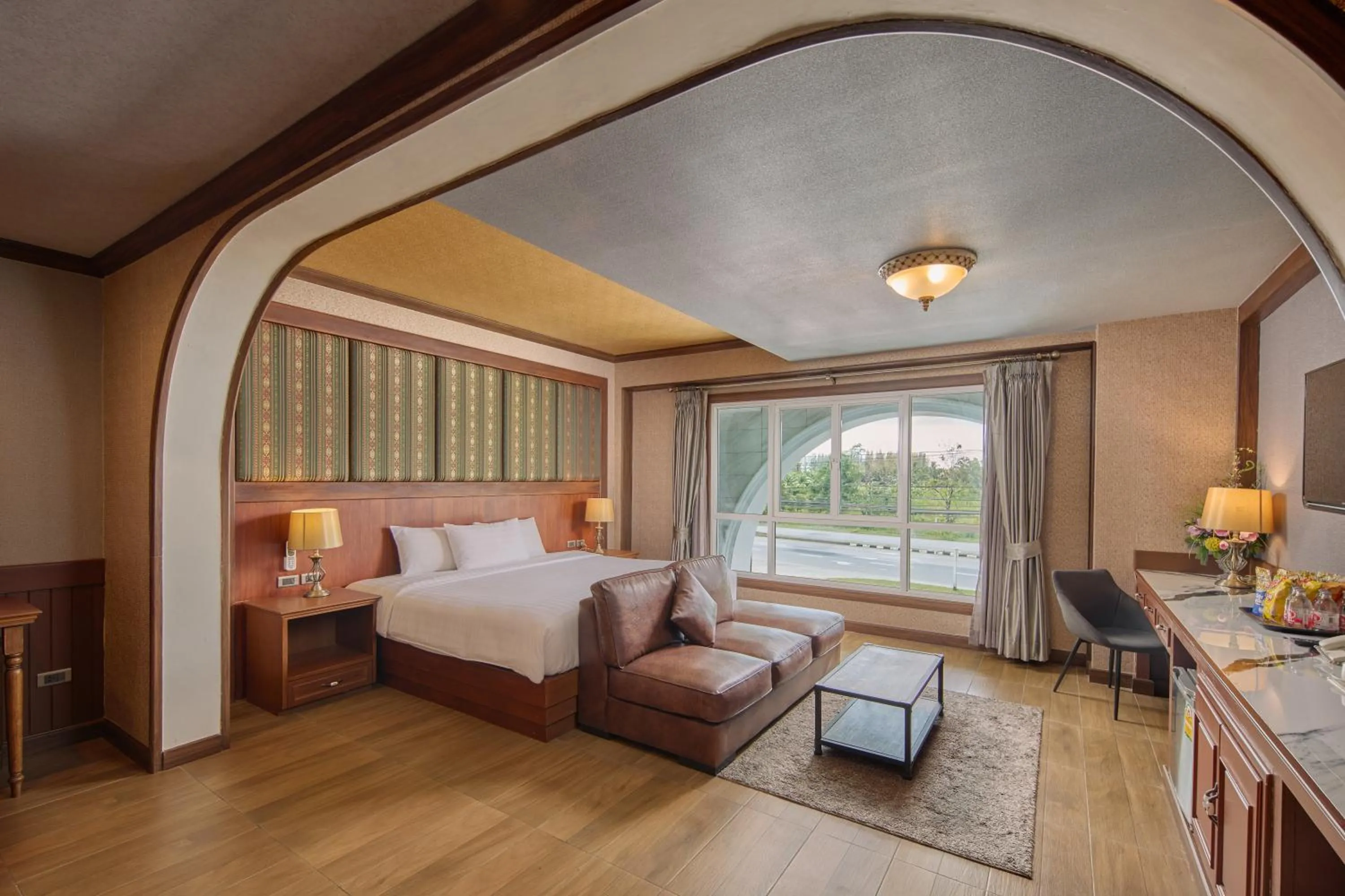 Bed in Le Erawan Phang Nga Hotel