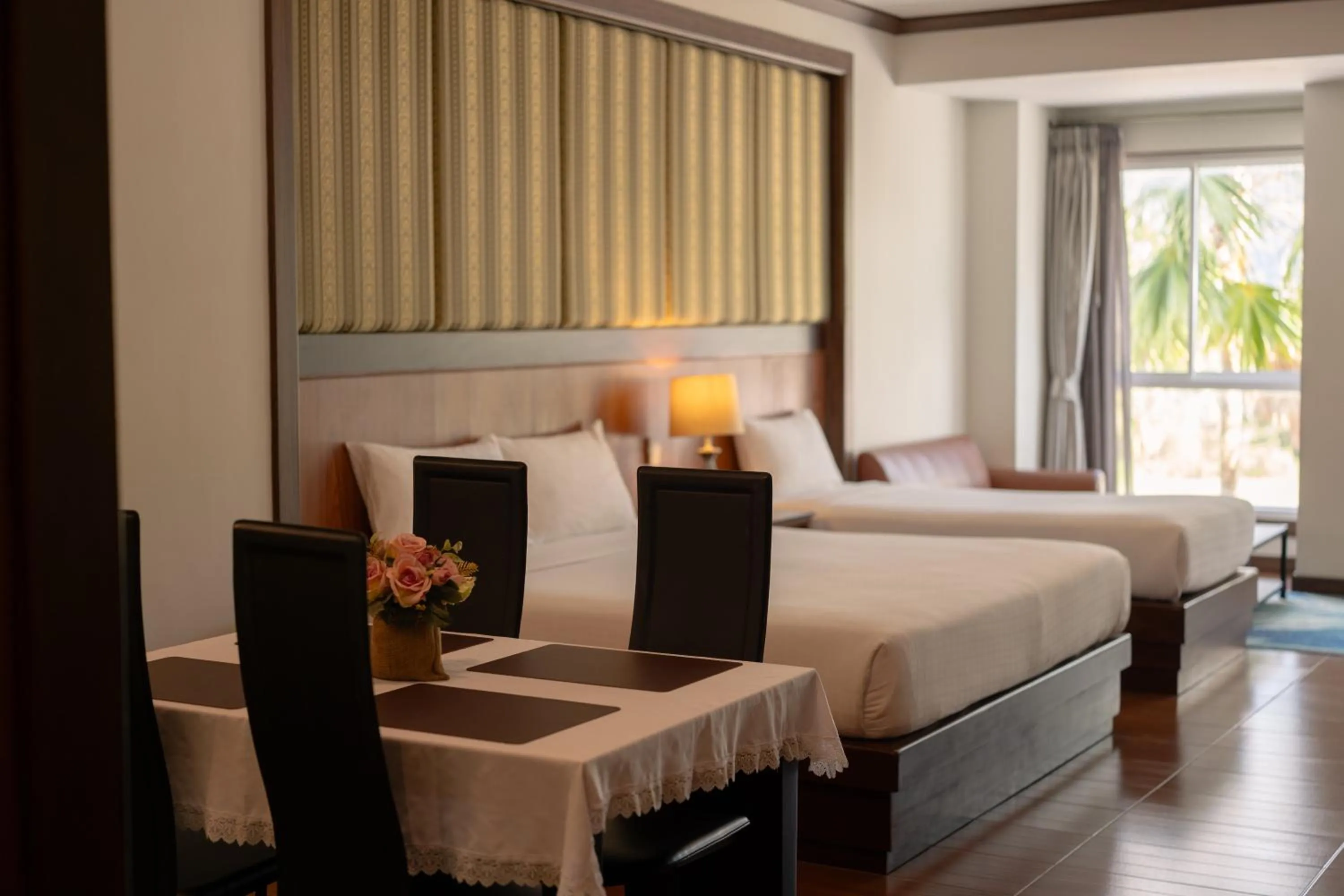 Bed in Le Erawan Phang Nga Hotel