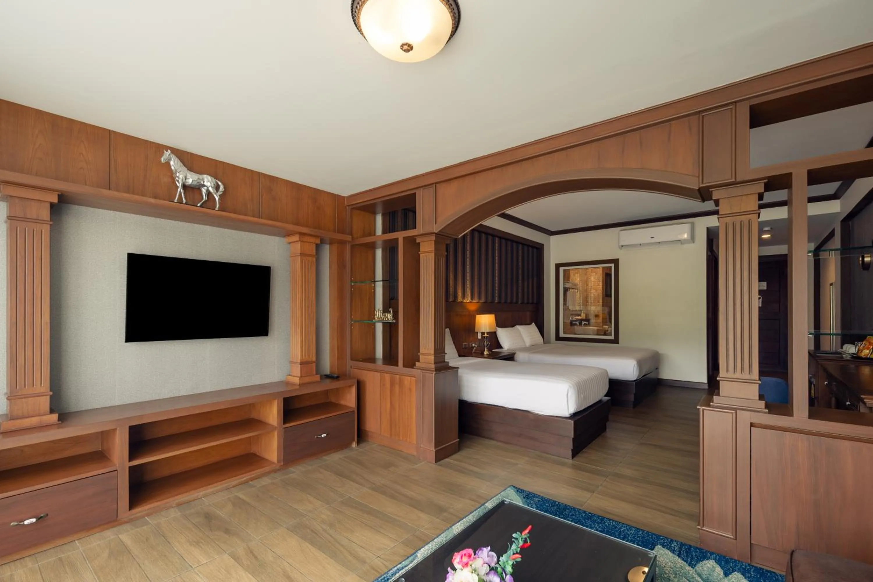 Bed in Le Erawan Phang Nga Hotel