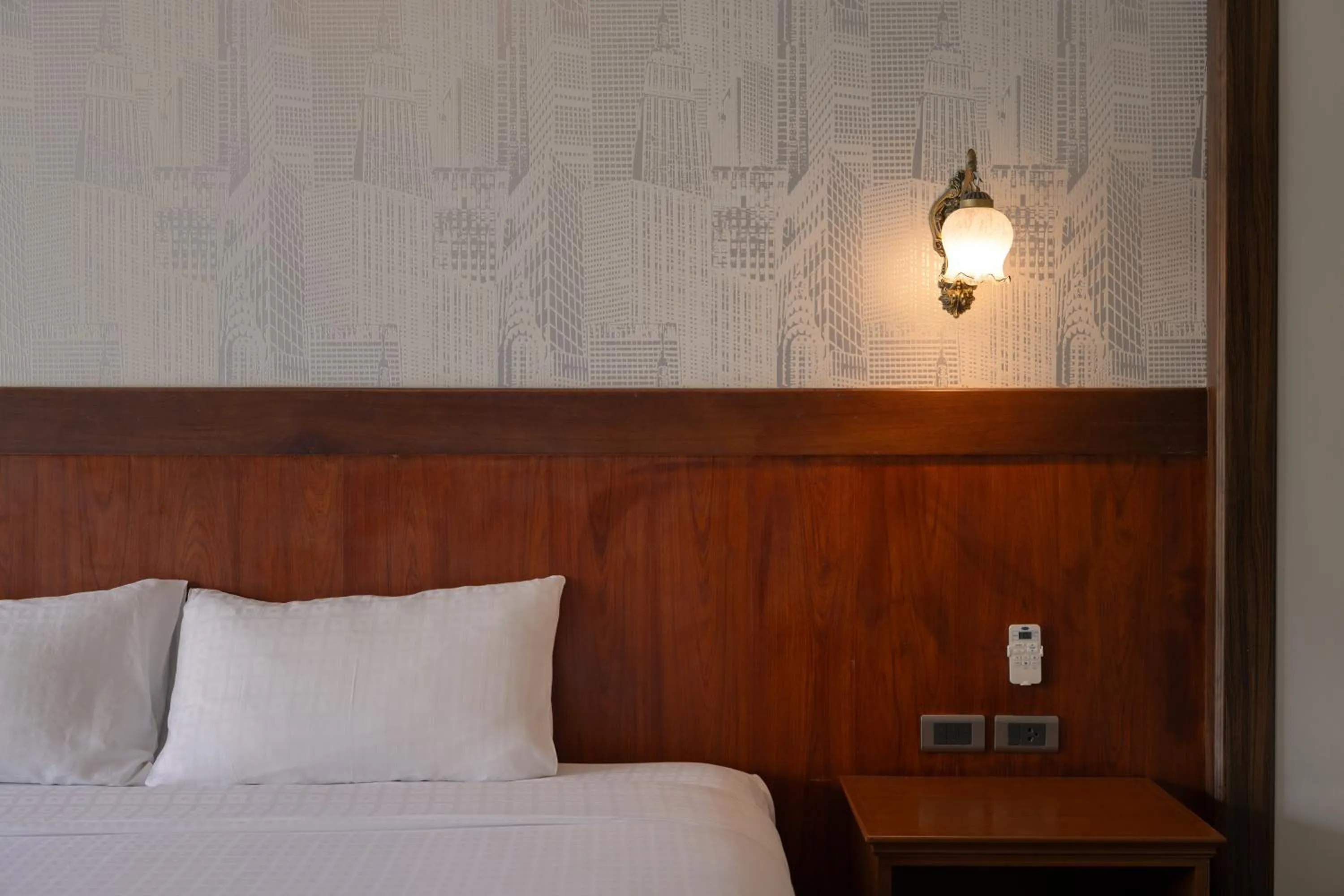 Bed in Le Erawan Phang Nga Hotel