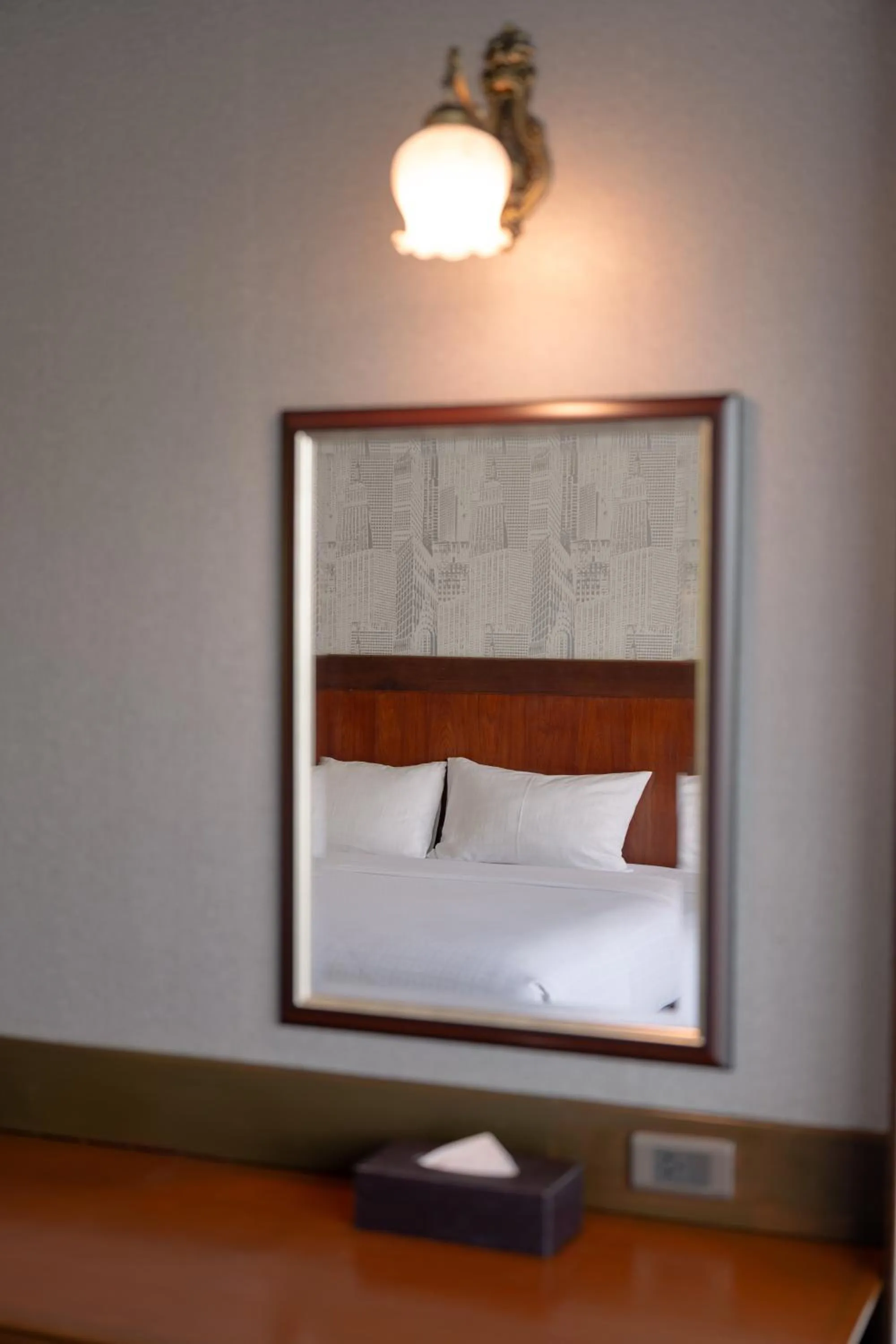 Bed in Le Erawan Phang Nga Hotel