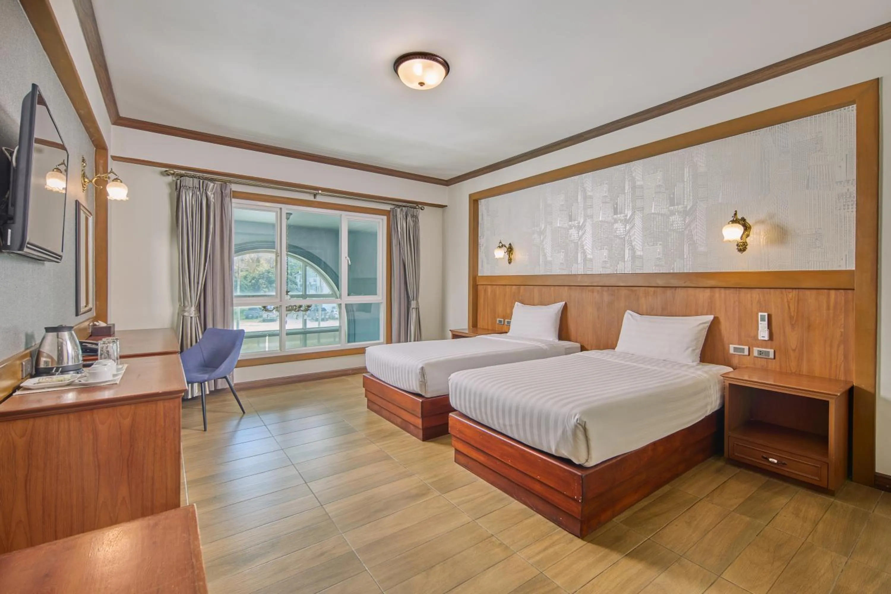 Bed in Le Erawan Phang Nga Hotel