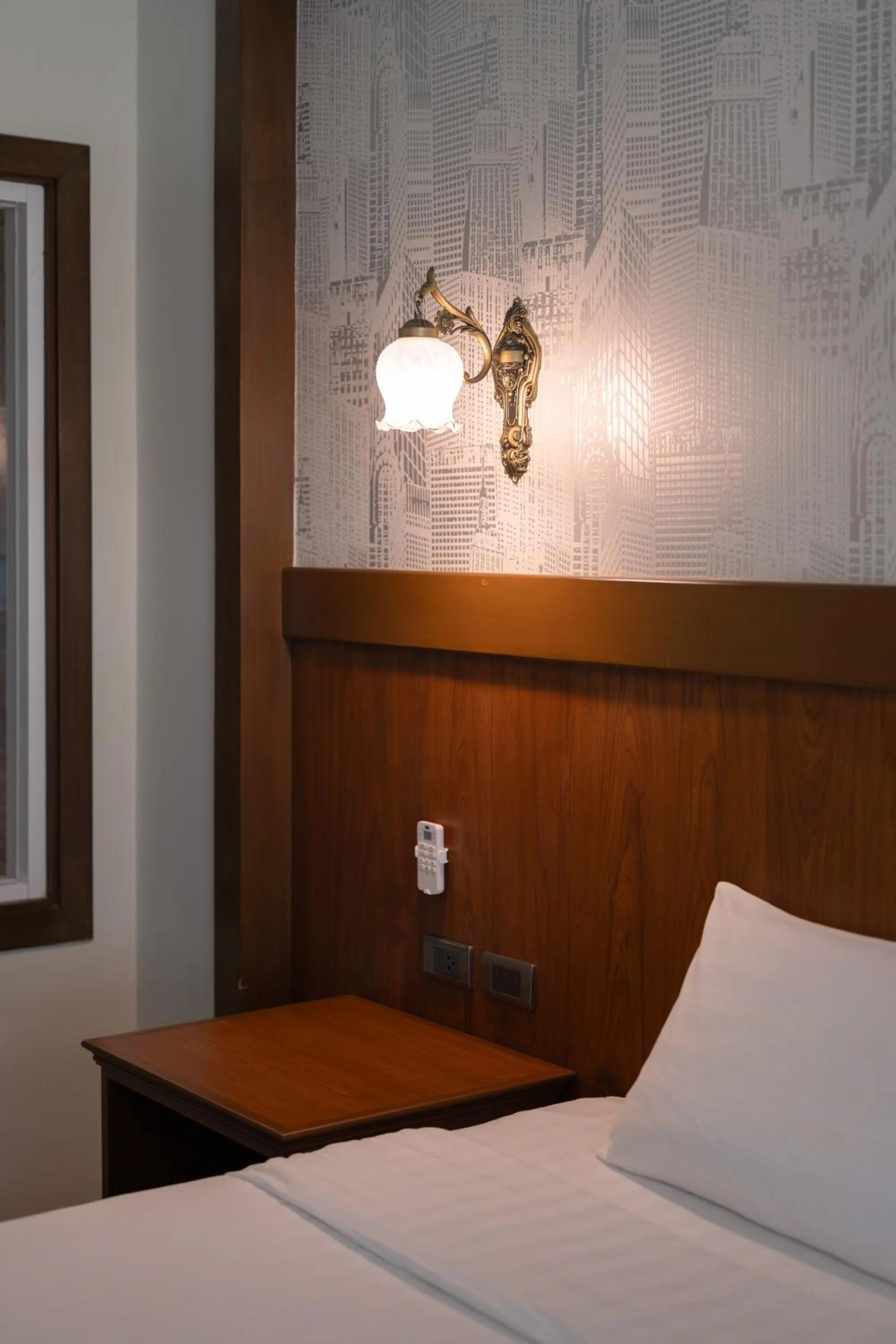 Bed in Le Erawan Phang Nga Hotel