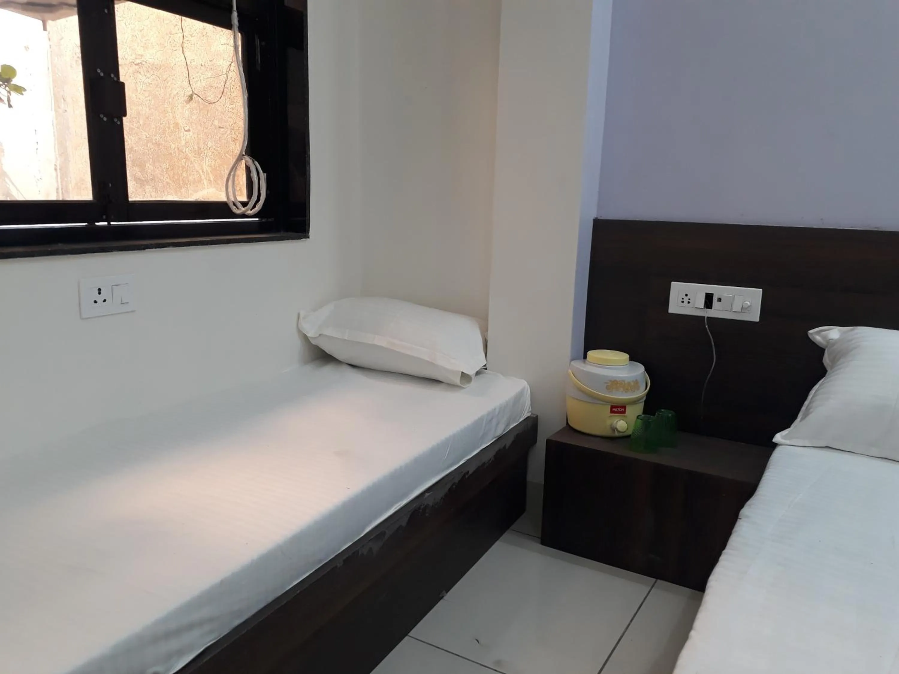 Bed in Hotel Chouhan Paradise