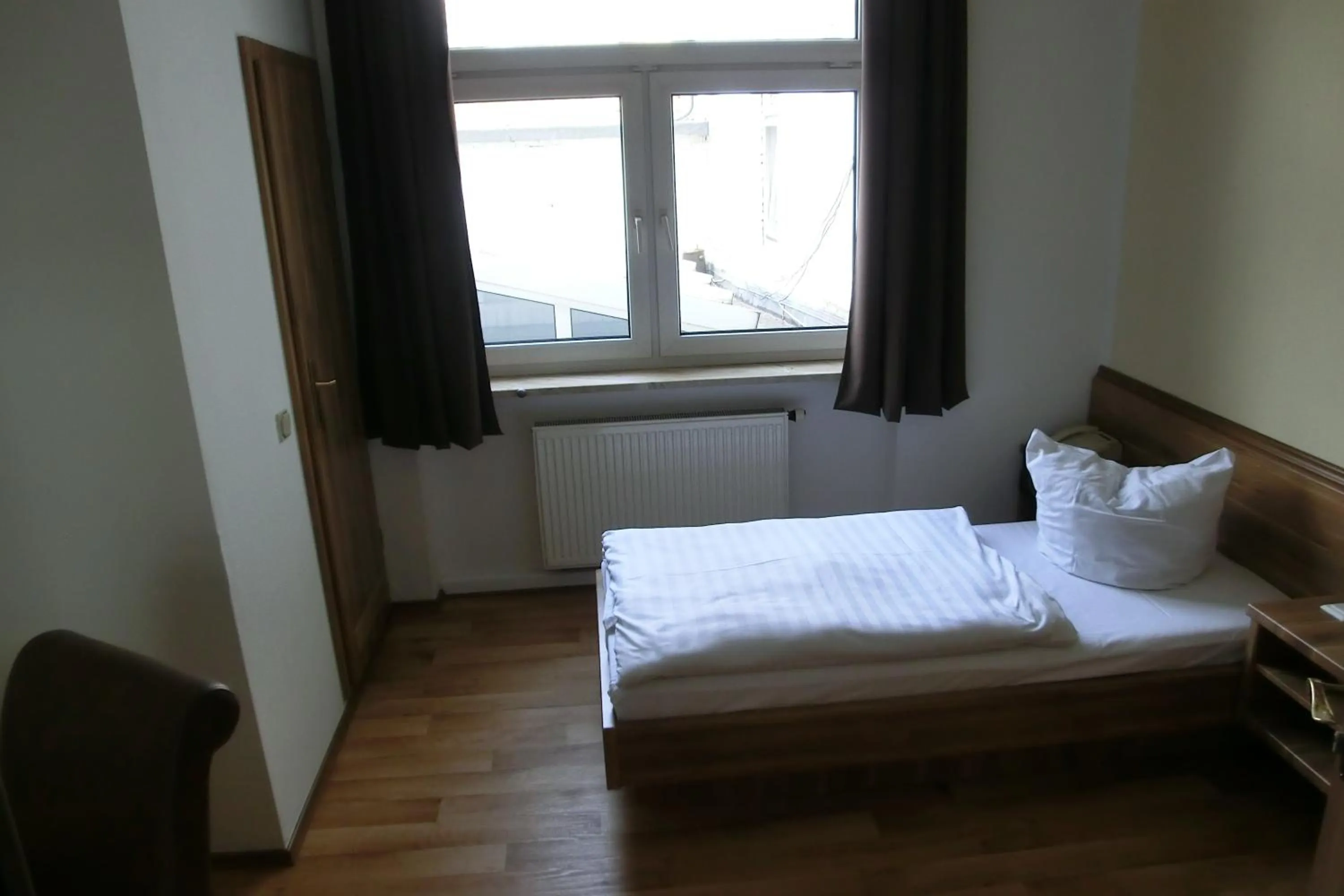 Photo of the whole room, Bed in Hotel Schweizer Hof