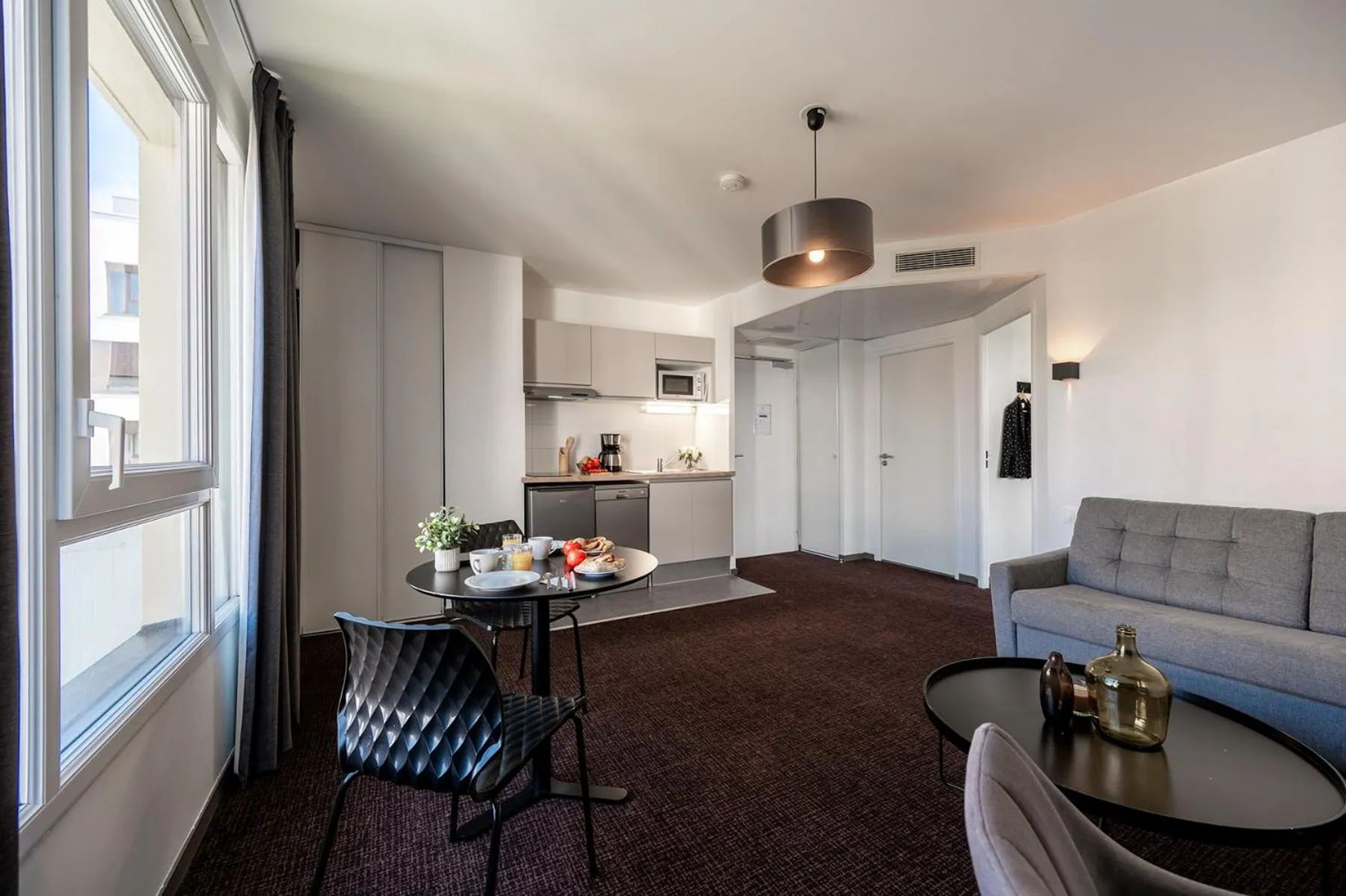 Photo of the whole room in Nemea Appart Hotel Europe Velizy Villacoublay