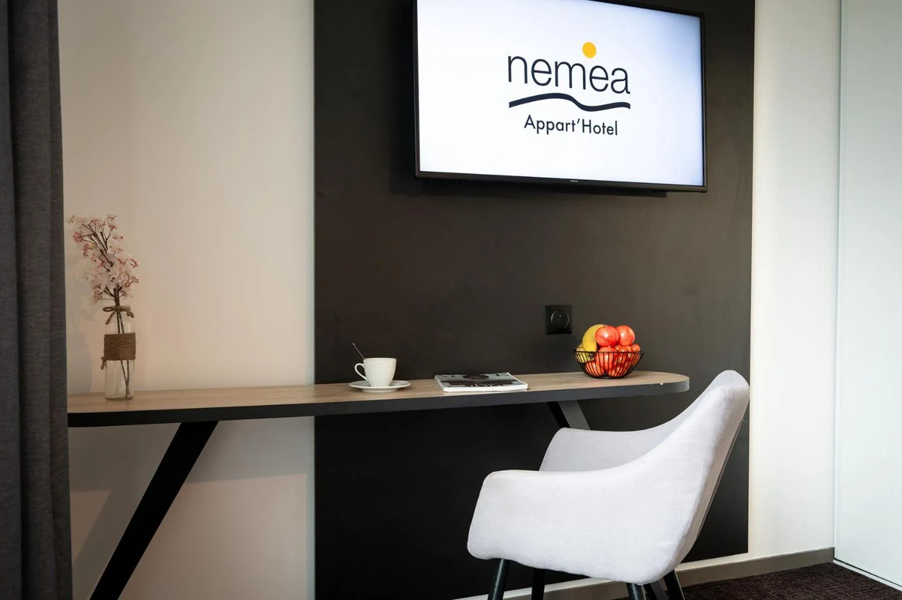 TV and multimedia in Nemea Appart Hotel Europe Velizy Villacoublay