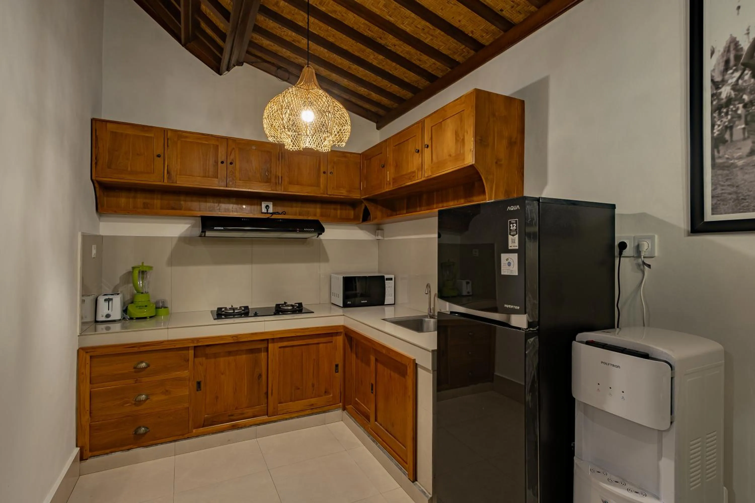 Kitchen or kitchenette in Villa Wananta