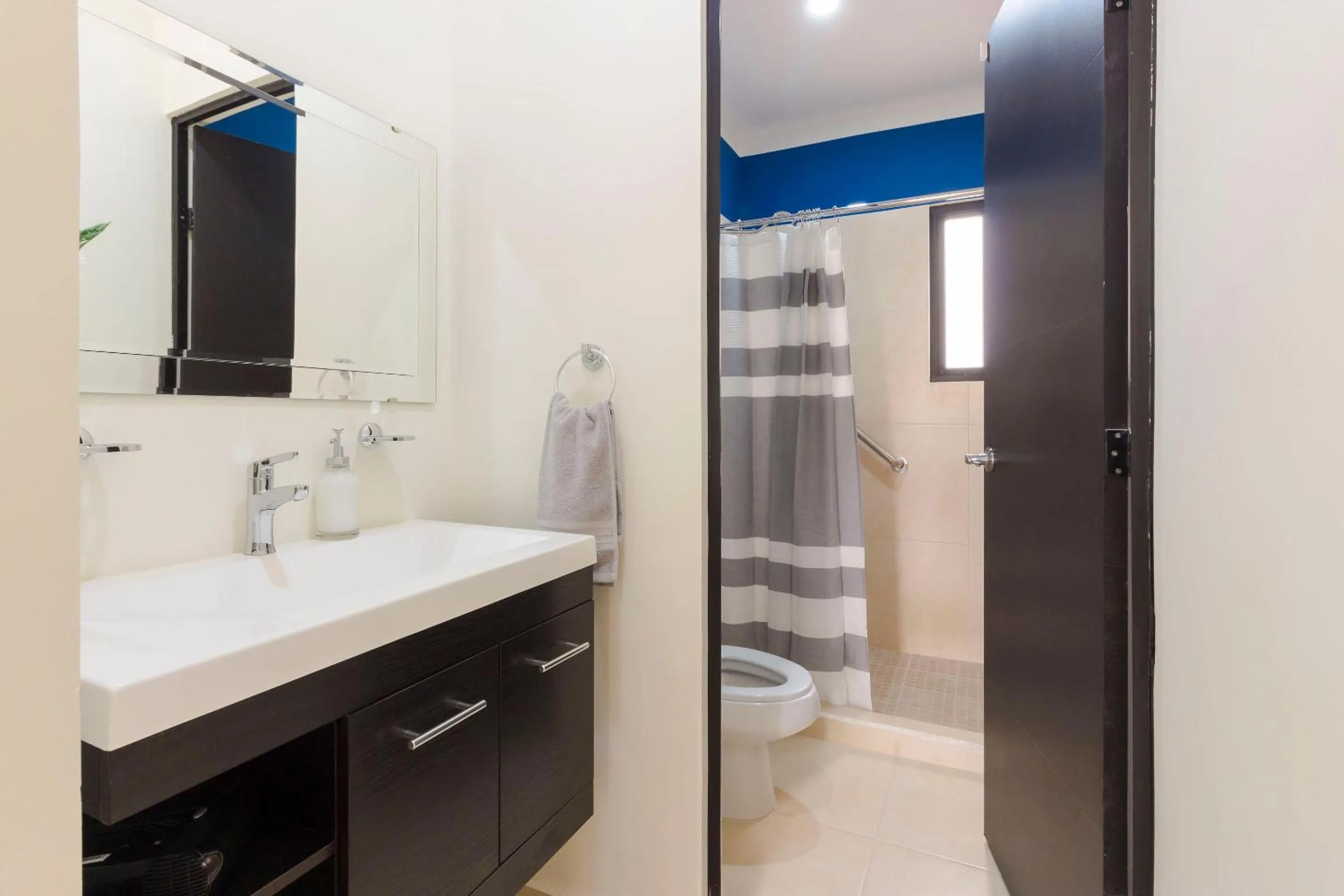 Toilet in Bright & Relaxing Full Apartment