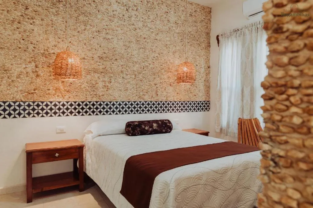 Bed in Hotel Boutique Bugambilias