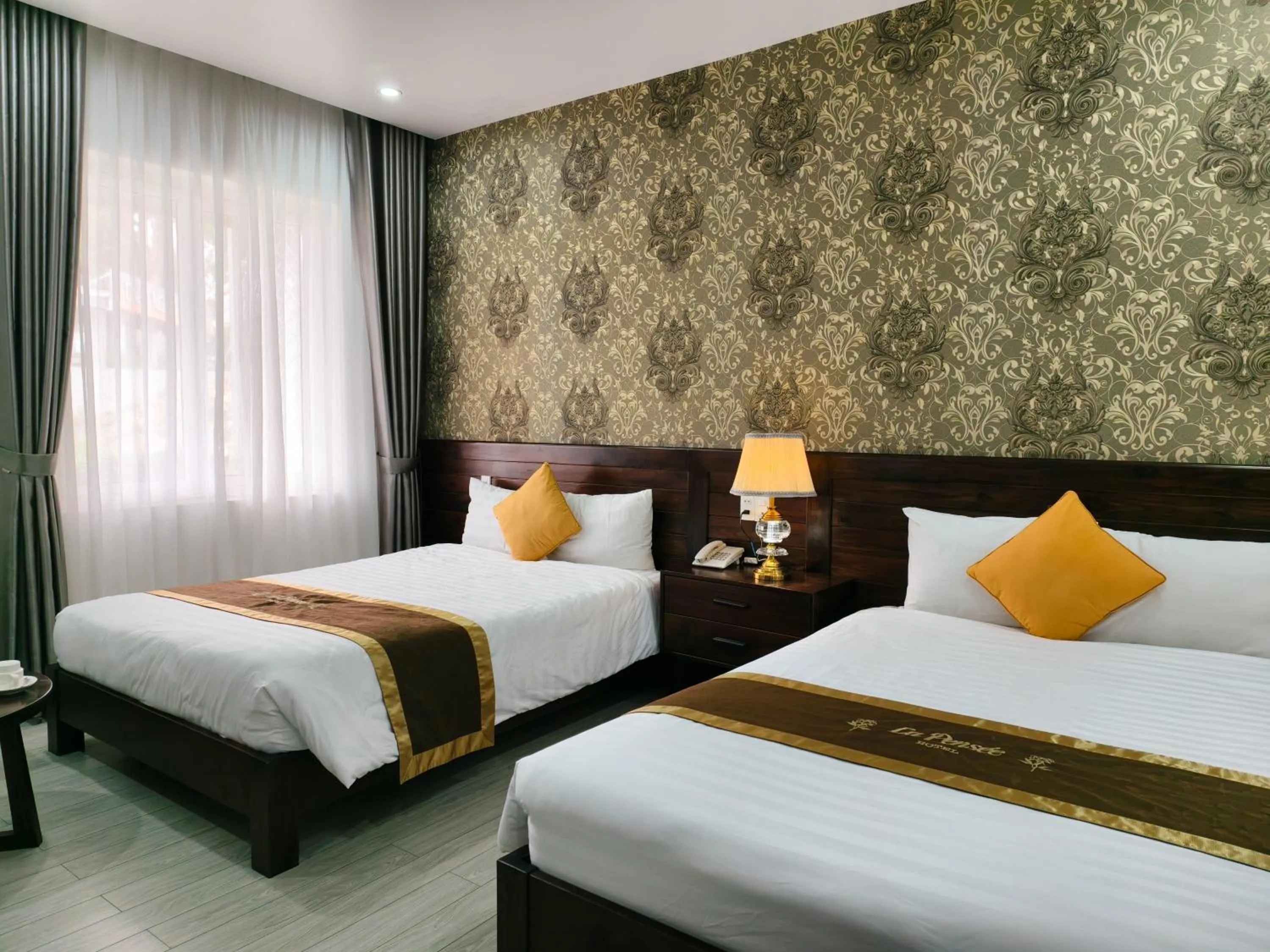 Bed in La Pense'e Hotel - Dalat