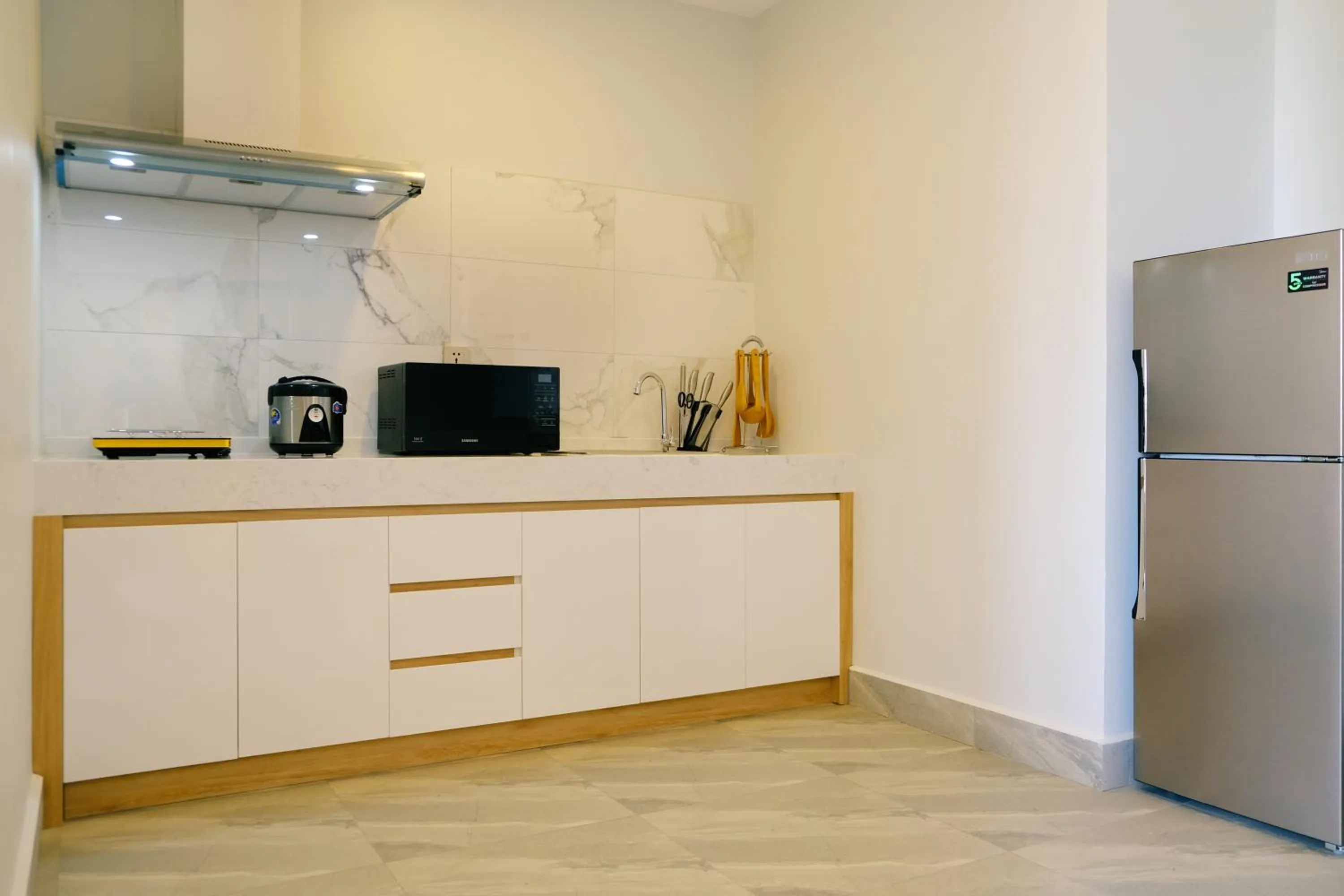 Kitchen or kitchenette in SS Hotel & Residence