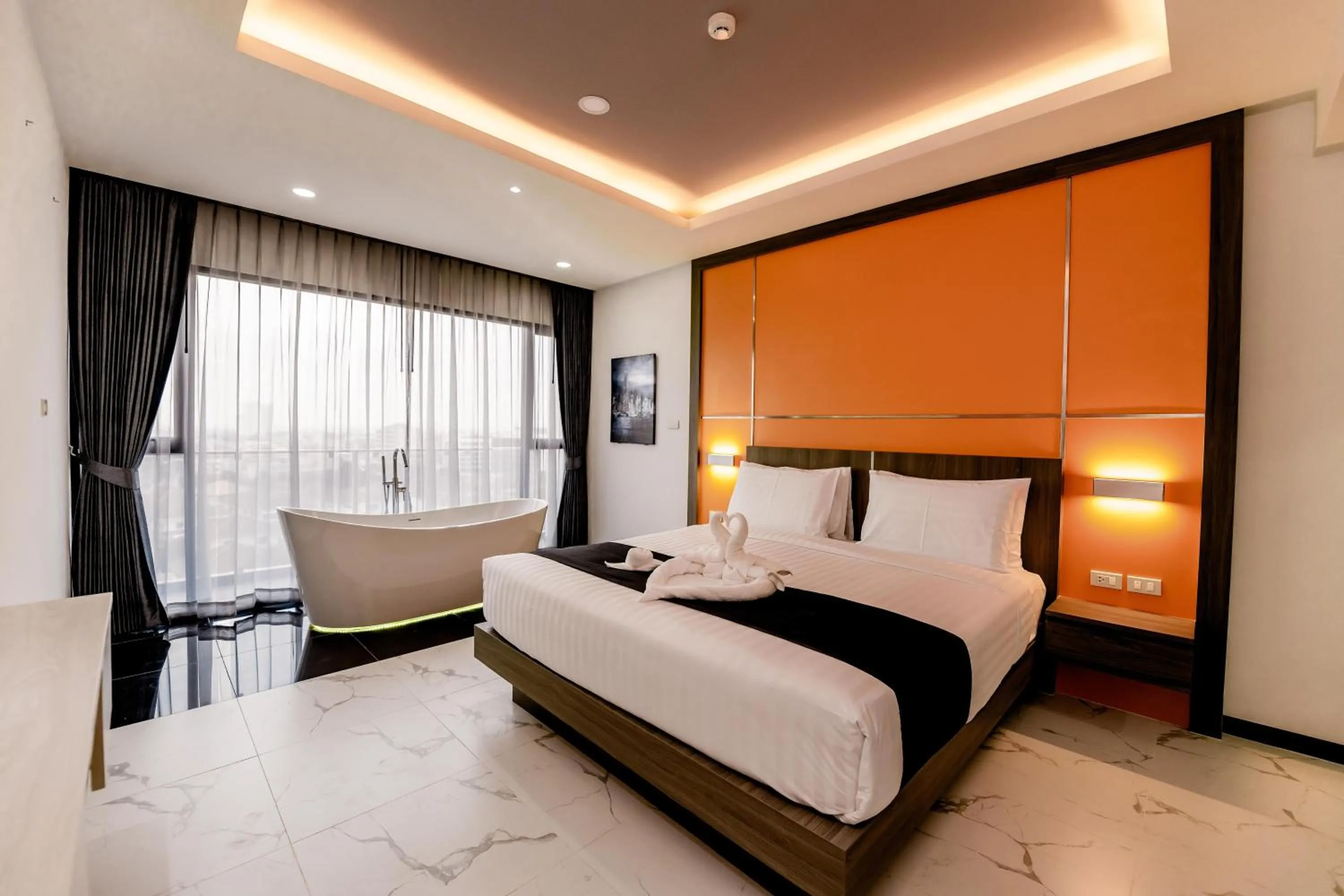 Bed in The Proud Hotel Pattaya - SHA Certified