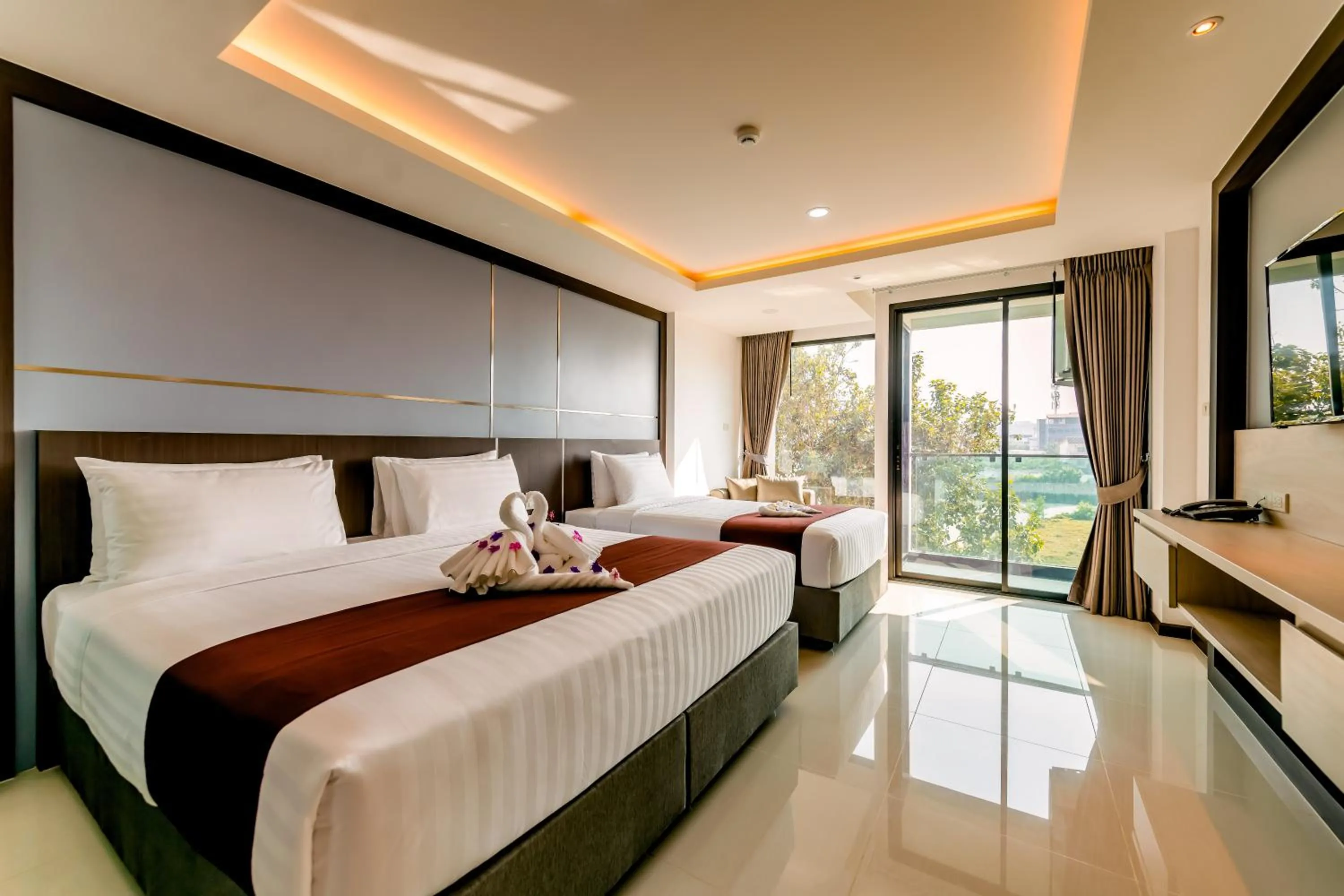 Bed in The Proud Hotel Pattaya - SHA Certified