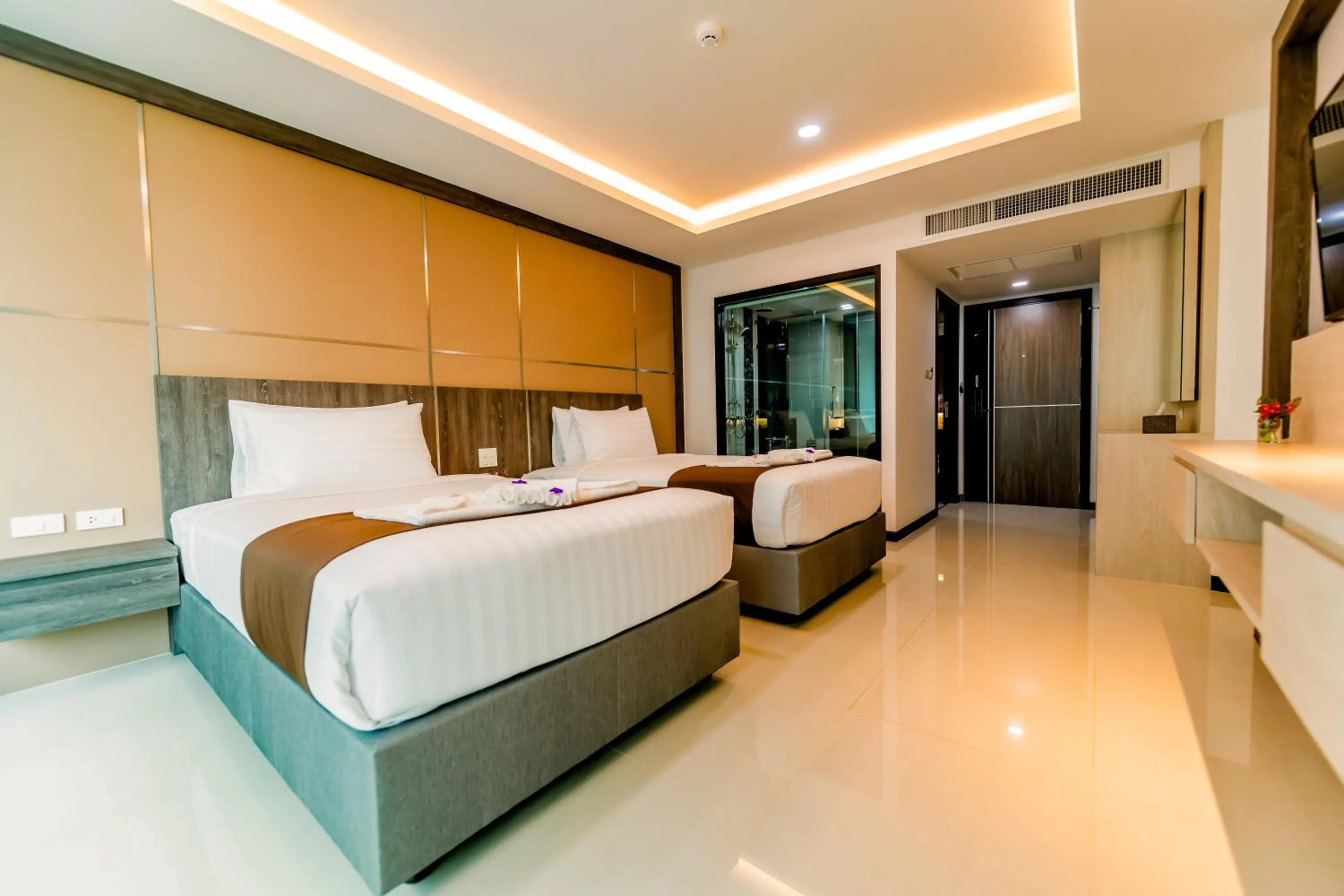 Bed in The Proud Hotel Pattaya - SHA Certified