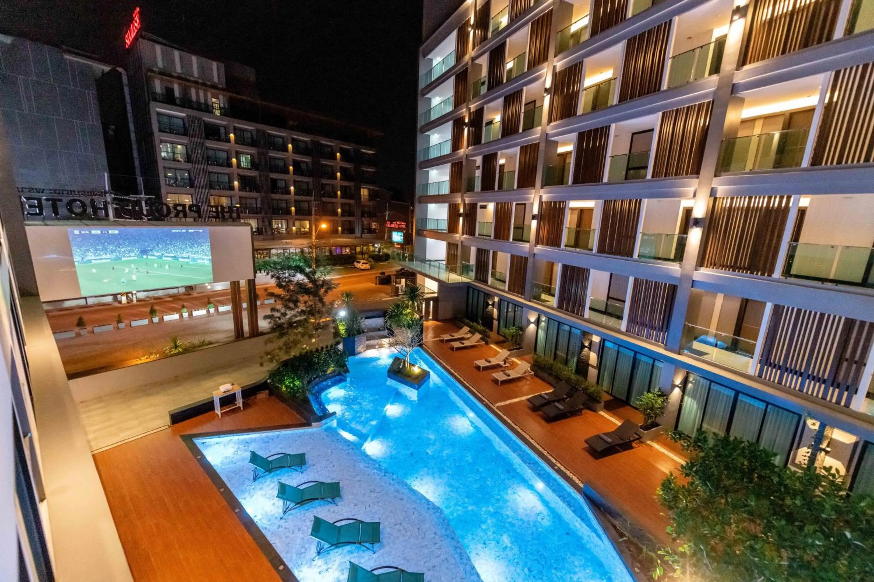 Swimming pool in The Proud Hotel Pattaya - SHA Certified